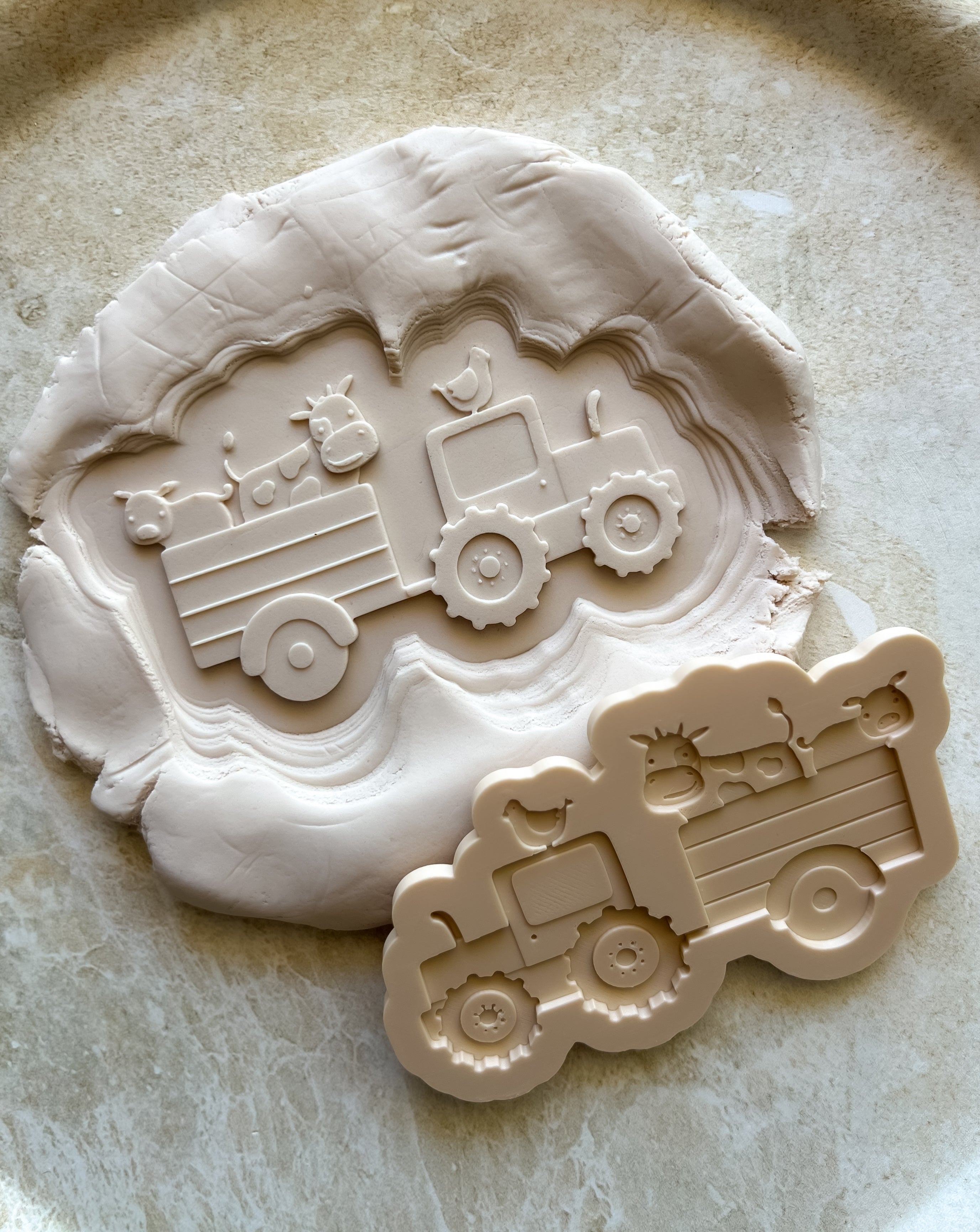 Tractor with trailer and farm animals debosser and cutter