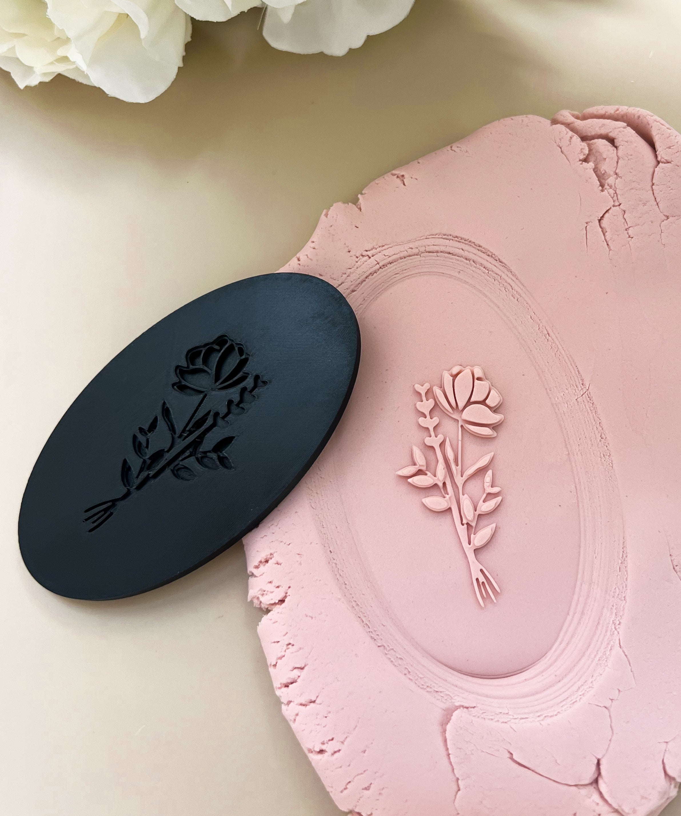 Delicate detailed flower on oval plate debosser and cutter