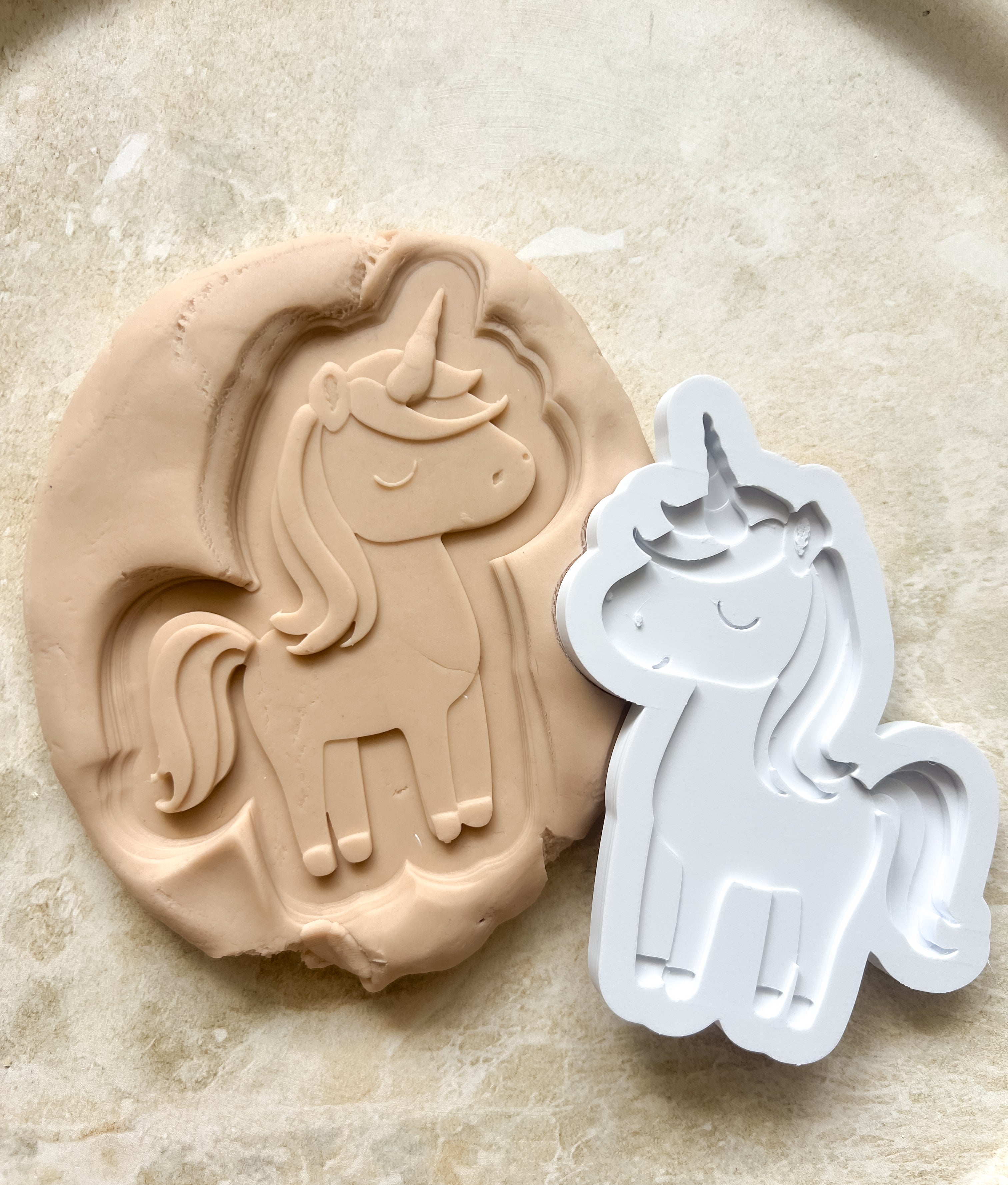 Unicorn debosser and cutter