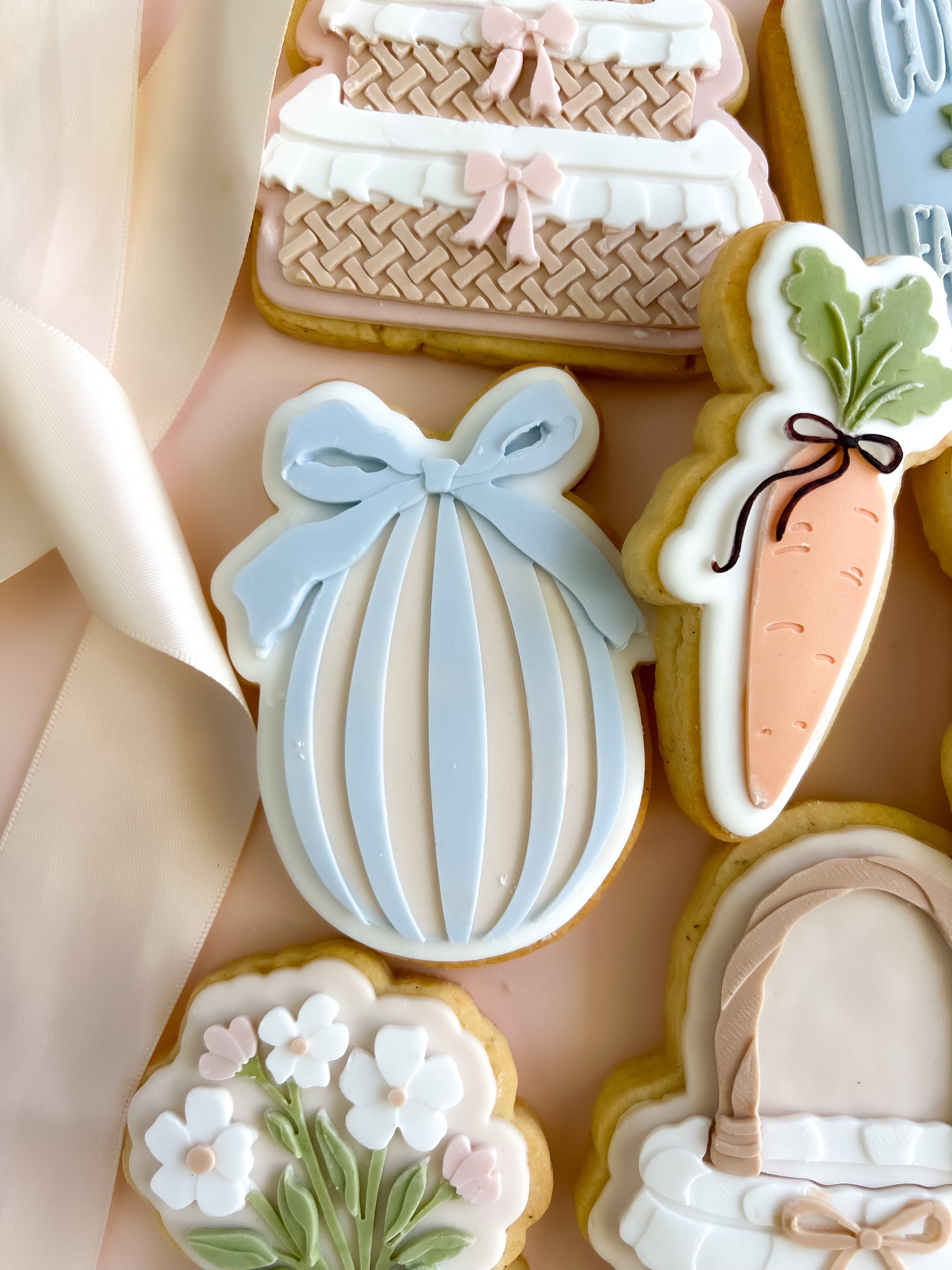 Striped egg with bow debosser and cutter
