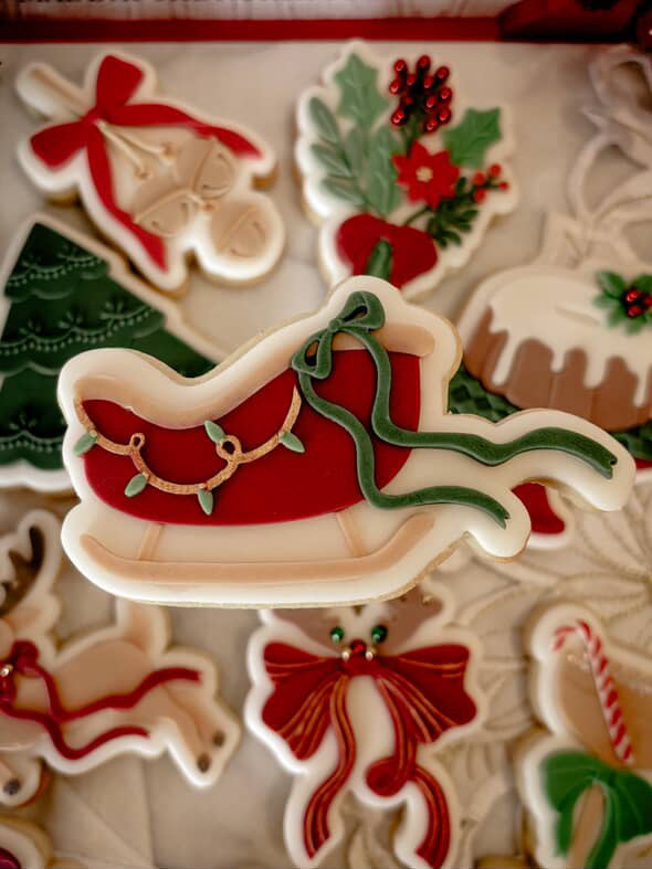 Sleigh with bow debosser and cutter