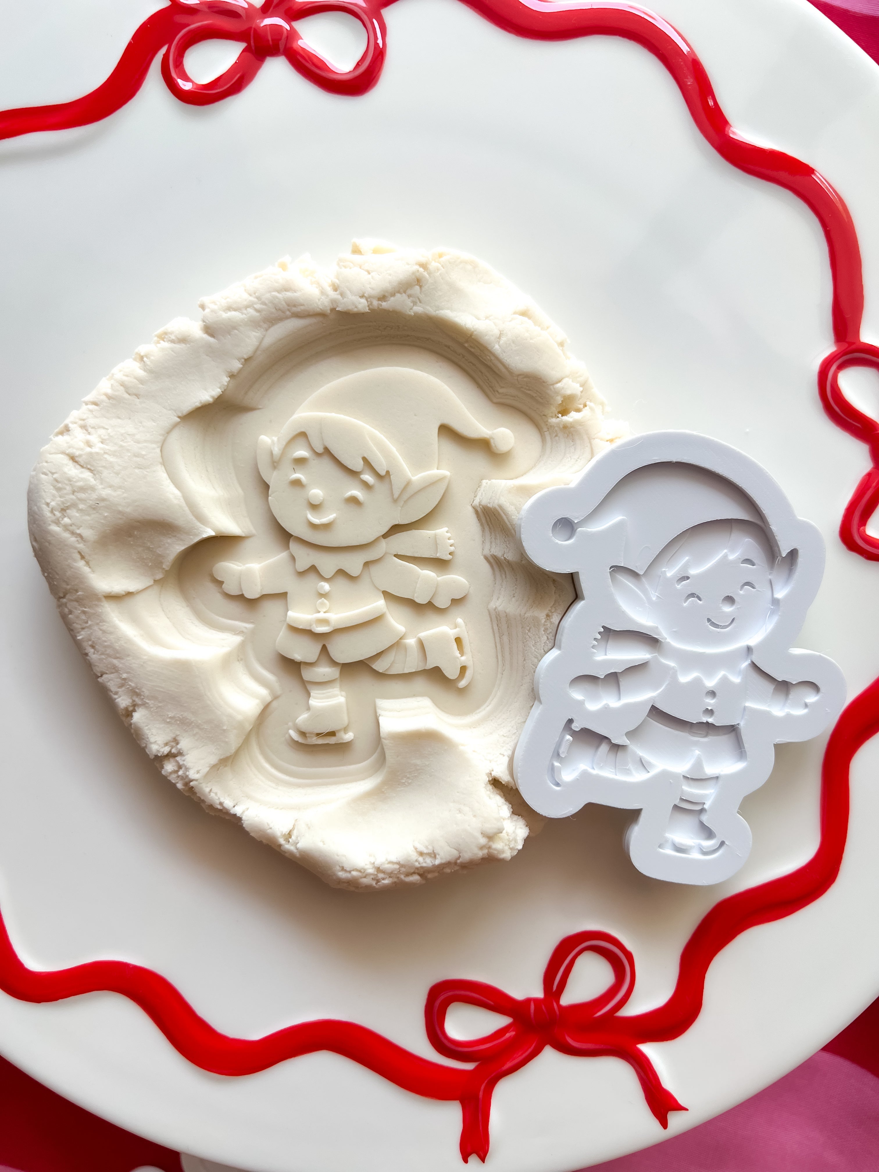 Skating elf debosser and cutter