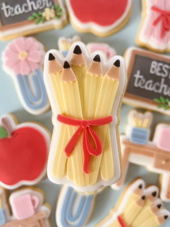 Tied pencils debosser and cutter