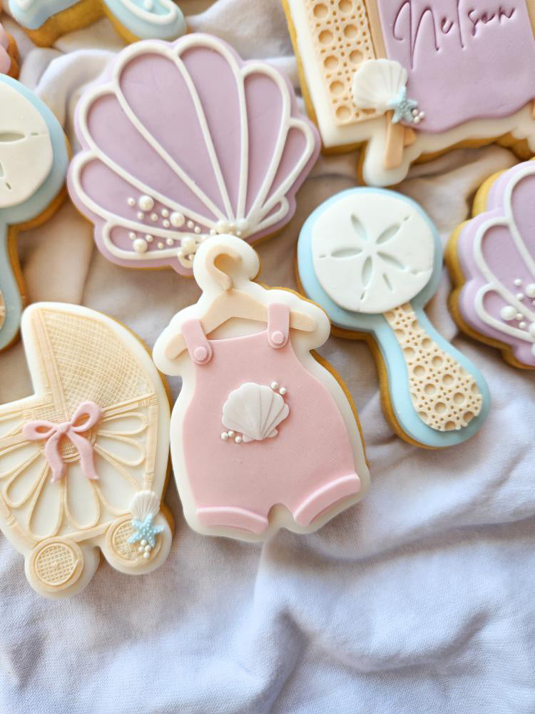 Sand dollar baby rattle debosser and cutter