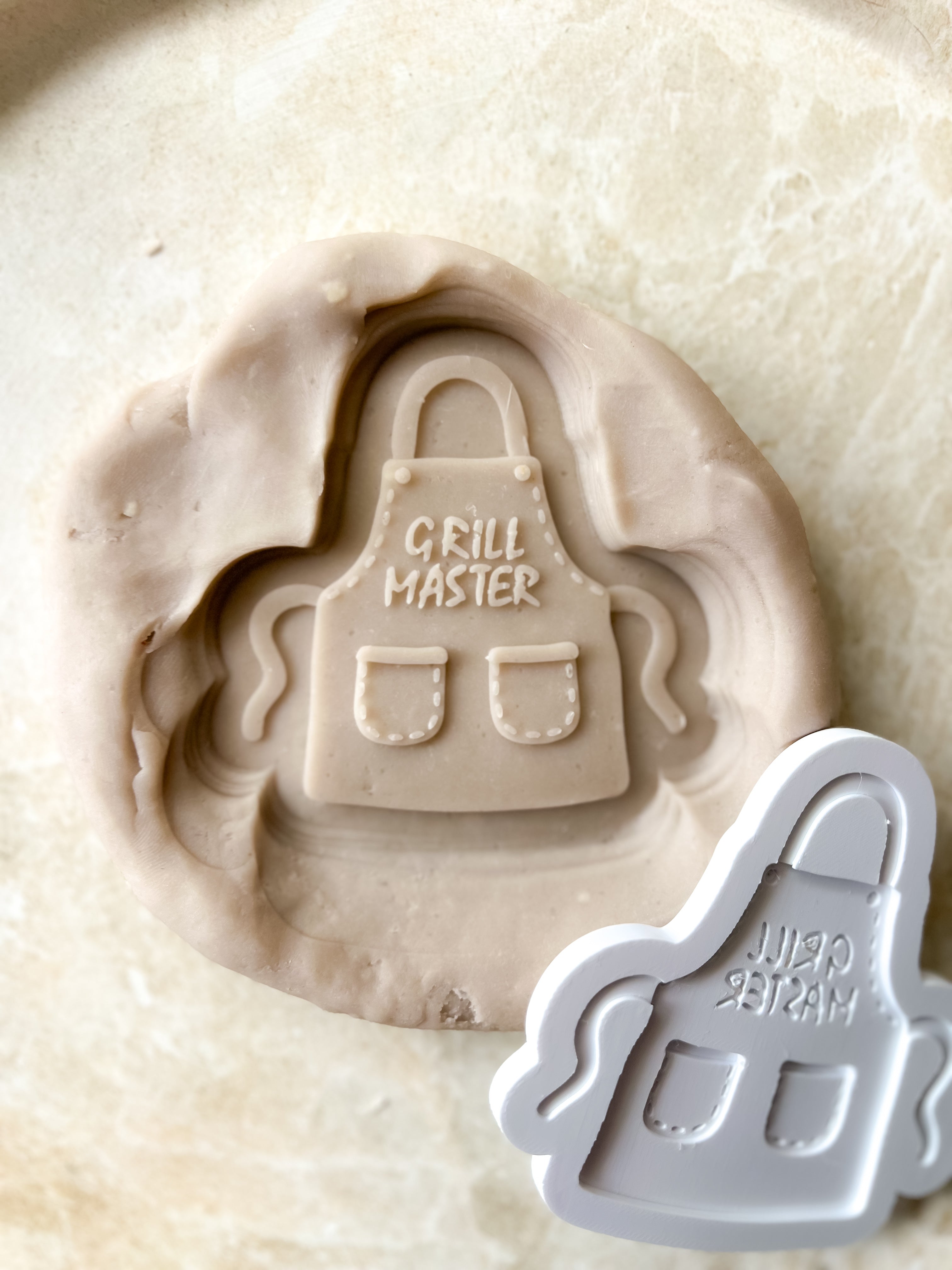Grill Master apron debosser and cutter