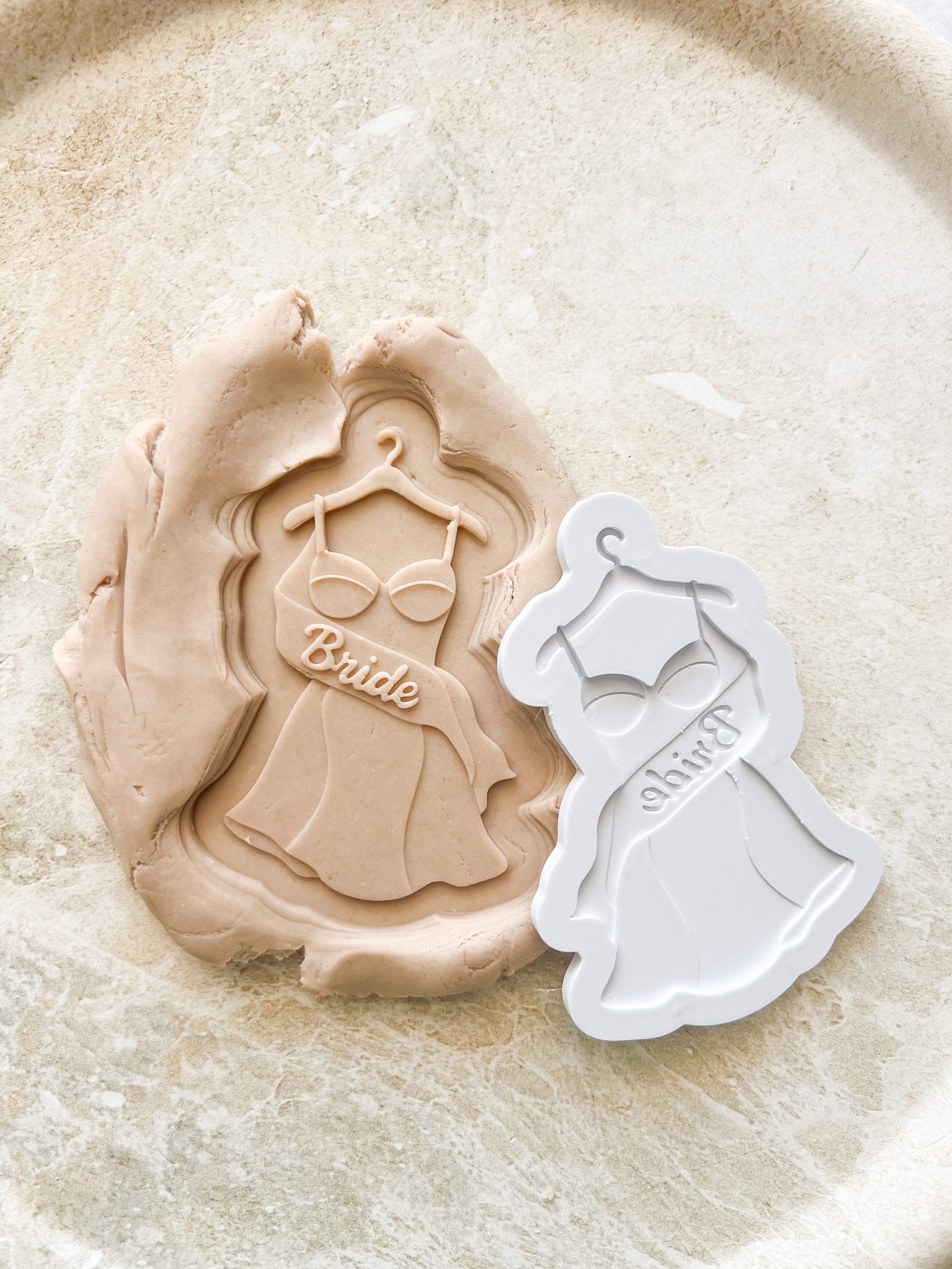 Dress with bride sash debosser and cutter