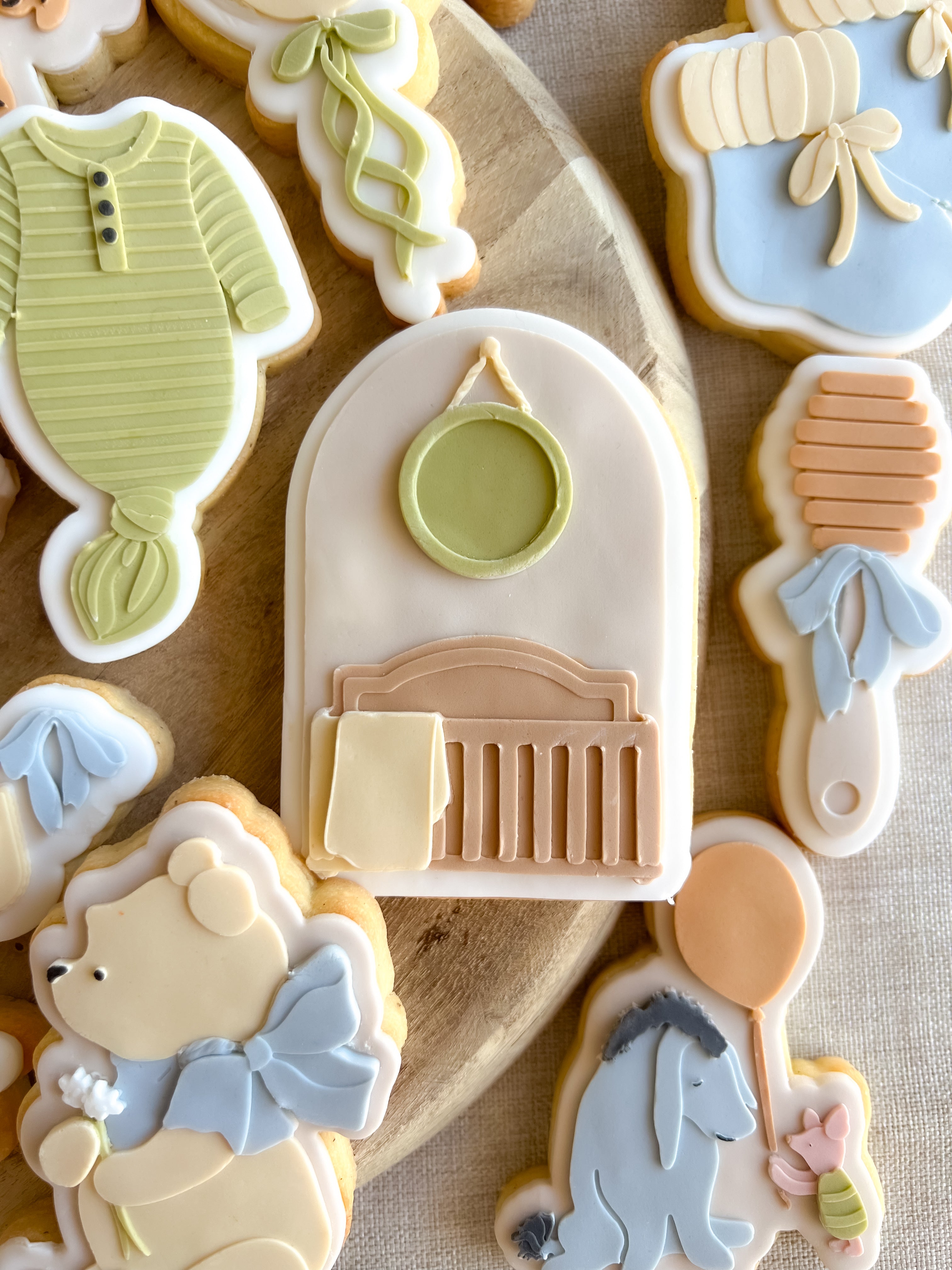 Baby crib on arch debosser and cutter