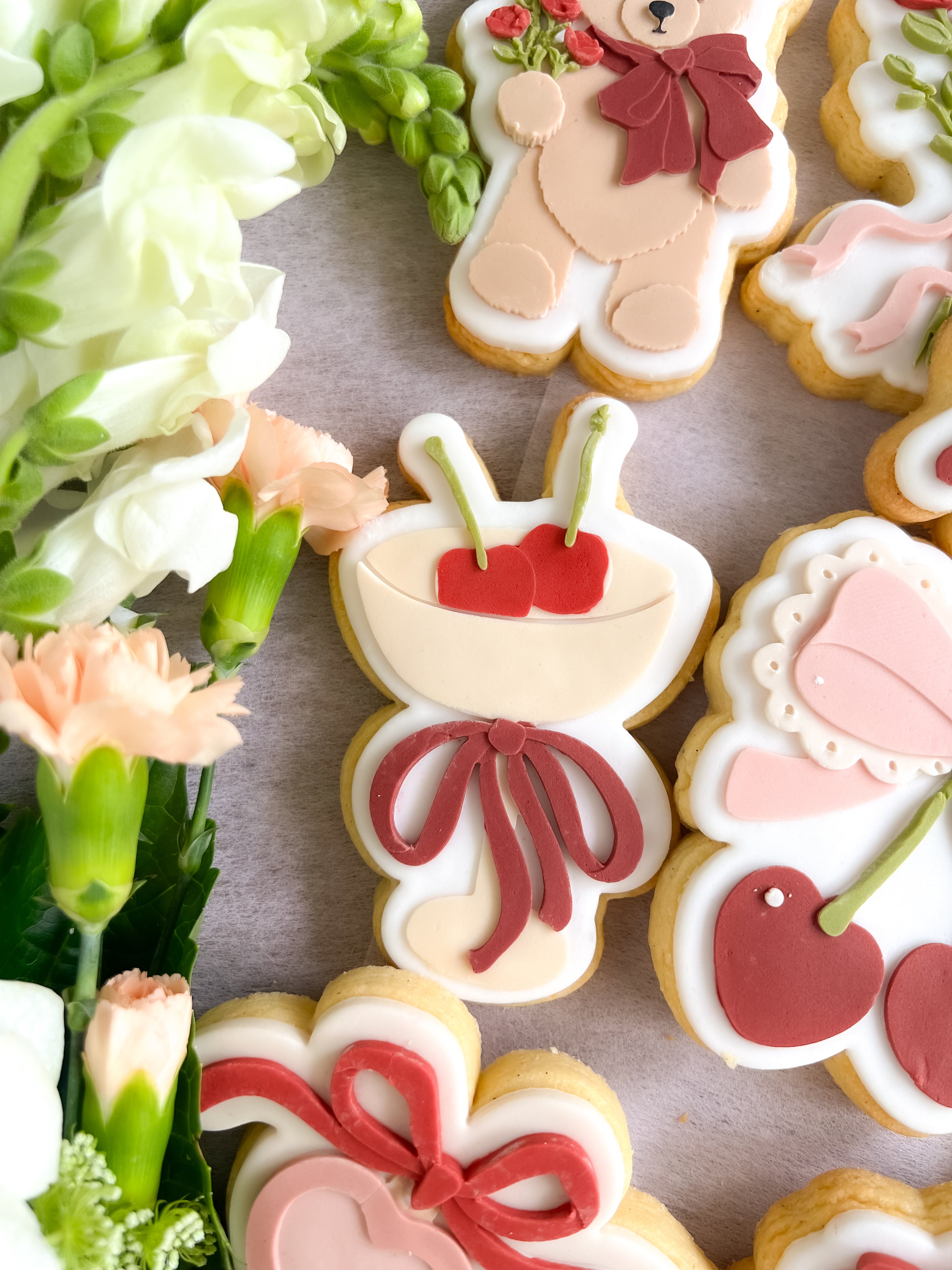 Cocktail glass with cherries and bow debosser and cutter