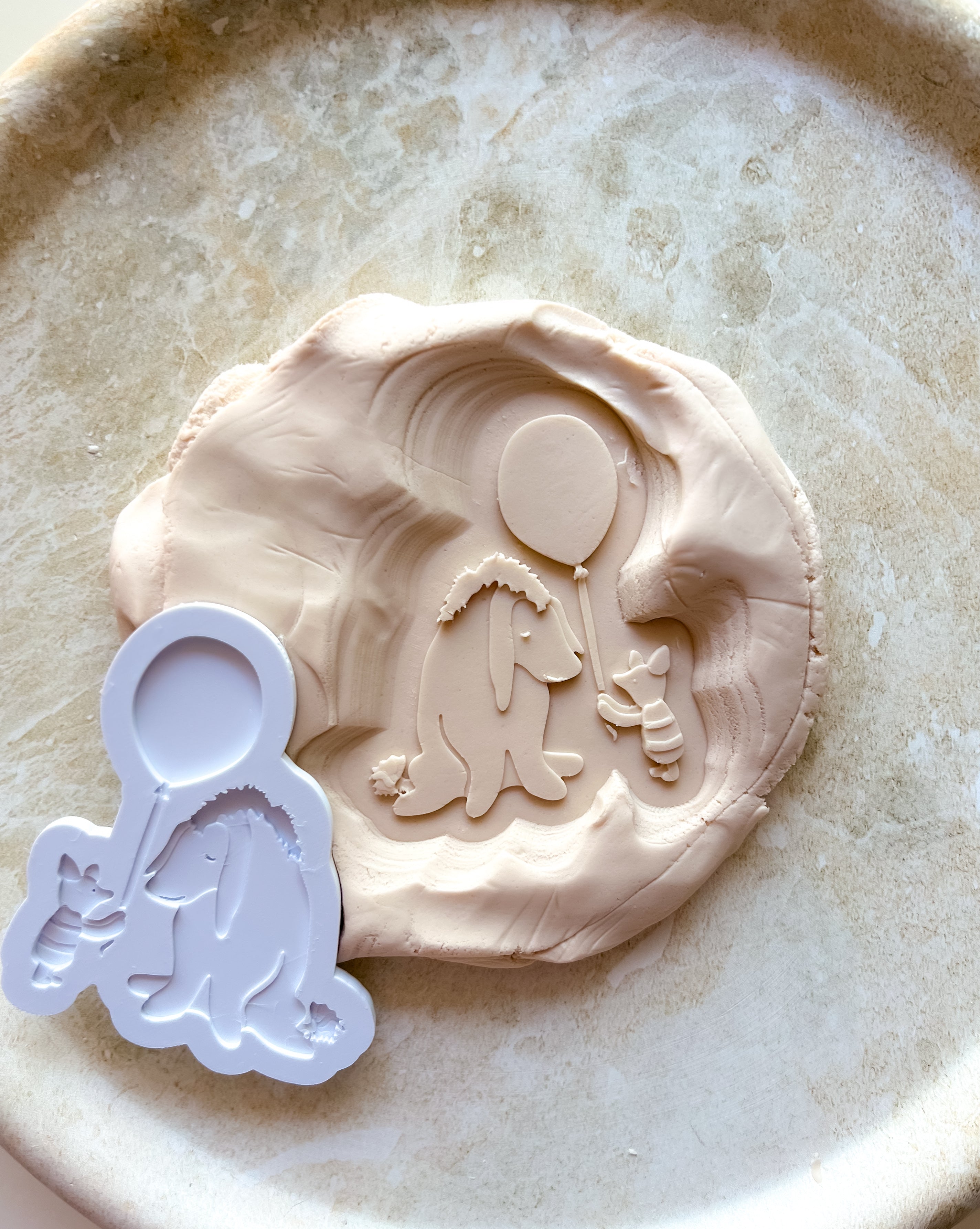 Vintage piglet giving donkey balloon debosser and cutter