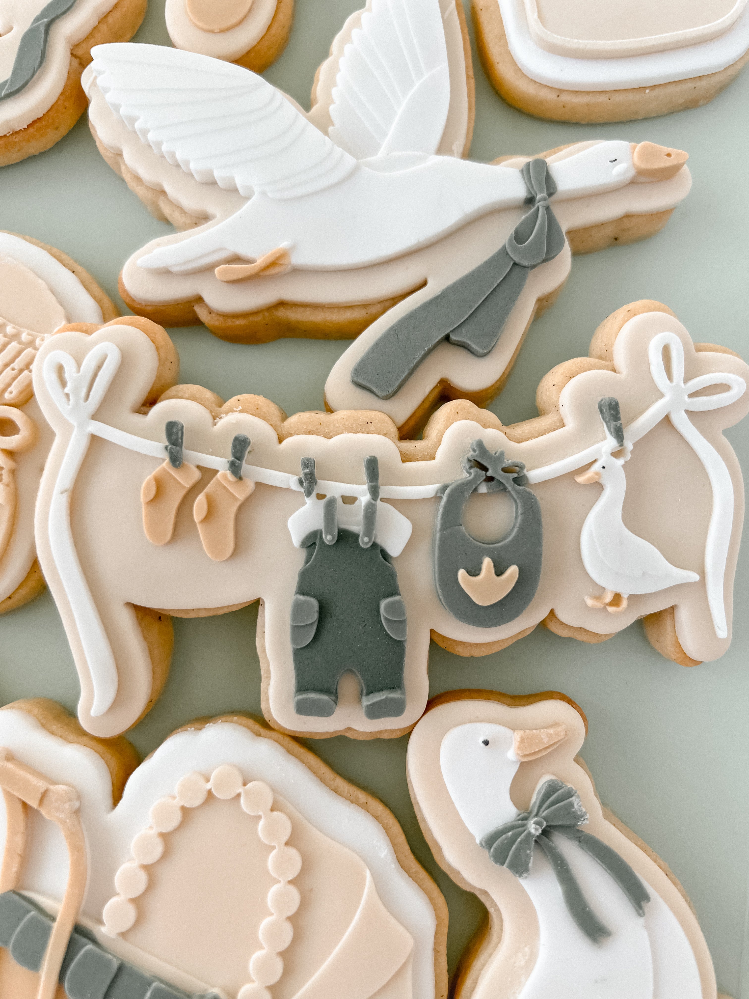 Baby goose items on clothesline debosser and cutter