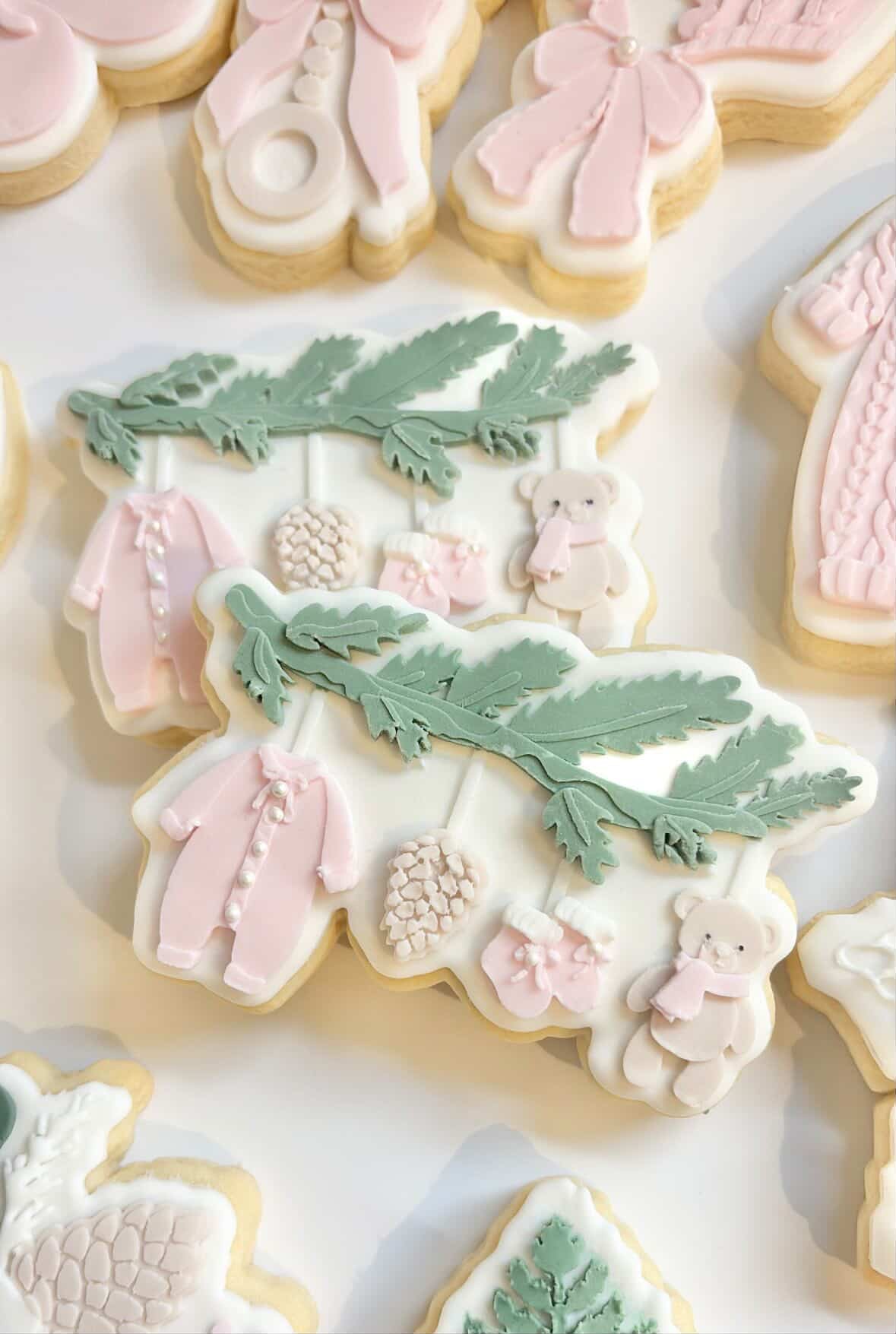 Winter baby items on branch debosser and cutter