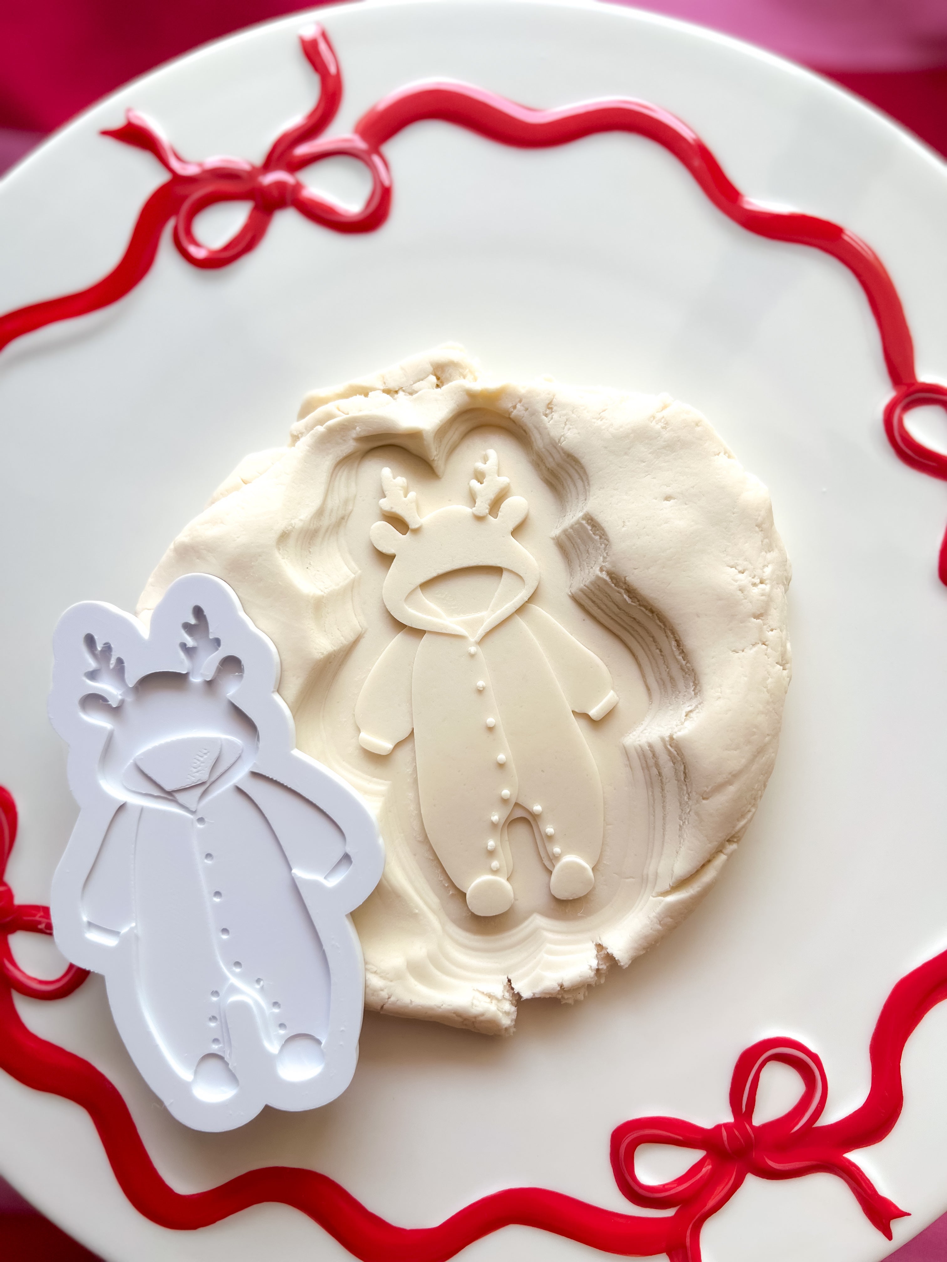 Reindeer baby onesie debosser and cutter