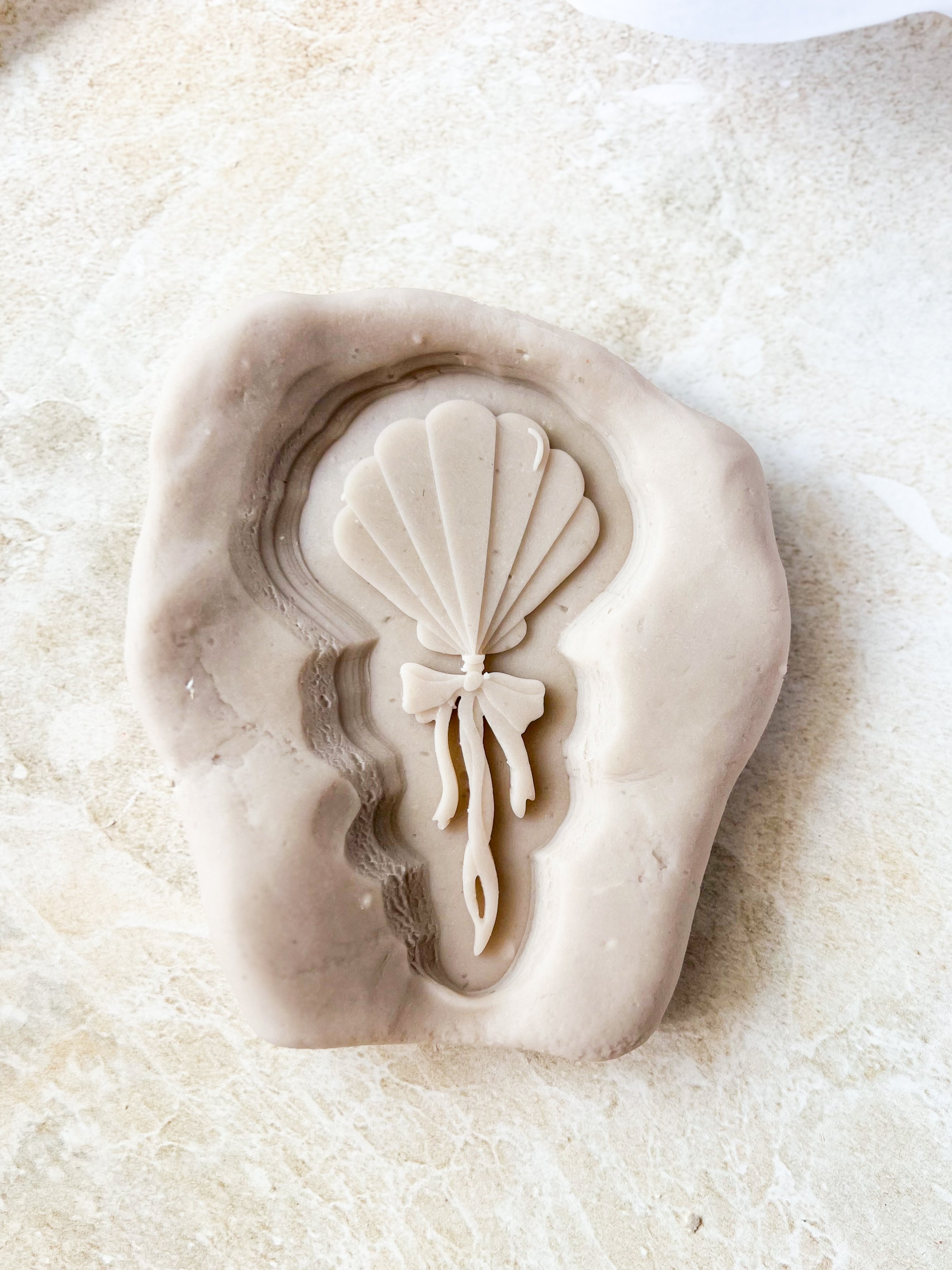 Shell balloon debosser and cutter