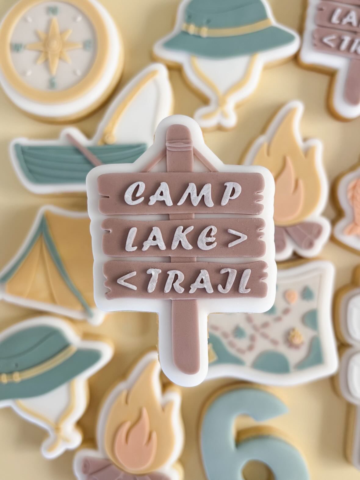 Campsite sign debosser and cutter