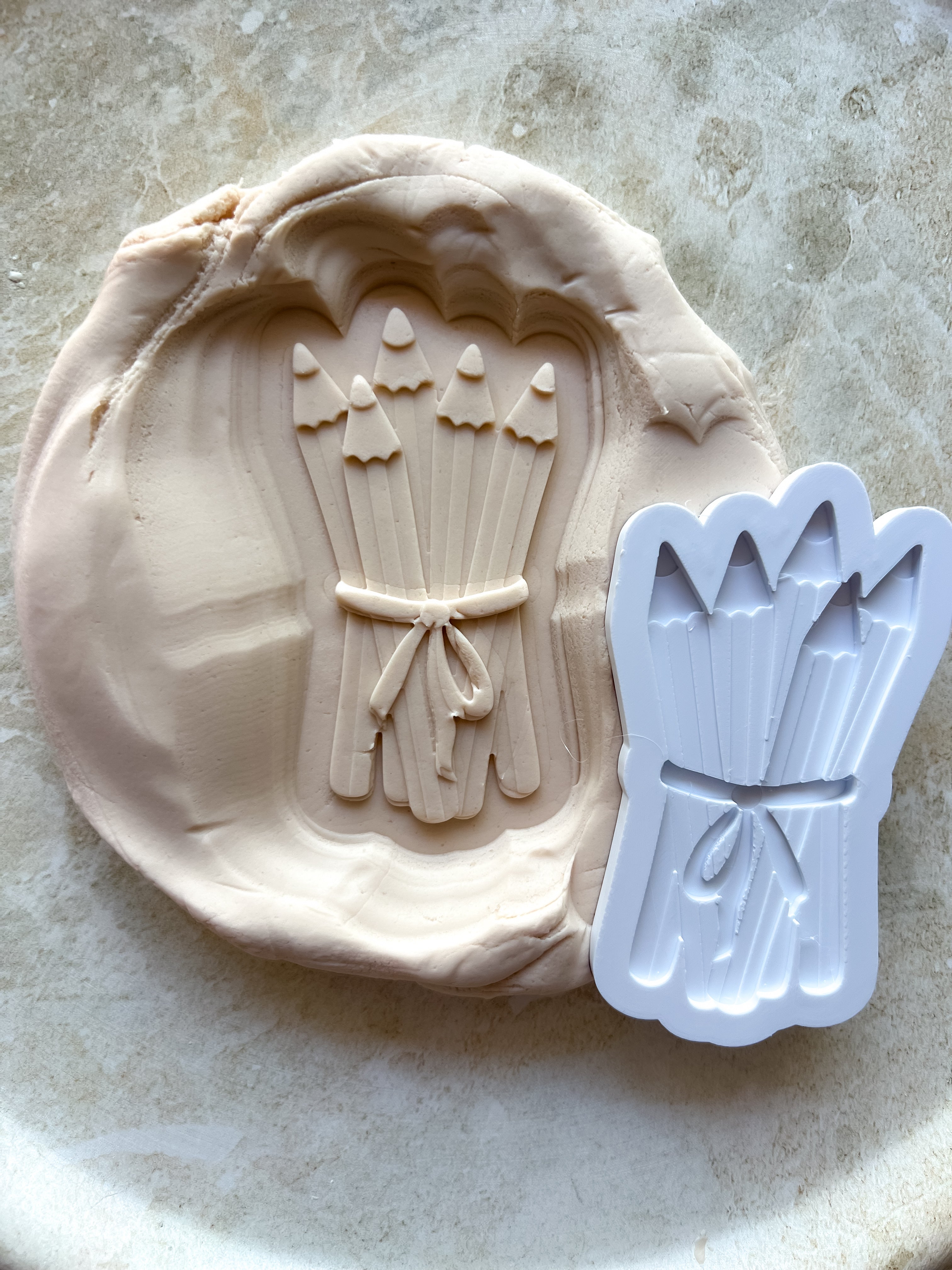 Tied pencils debosser and cutter