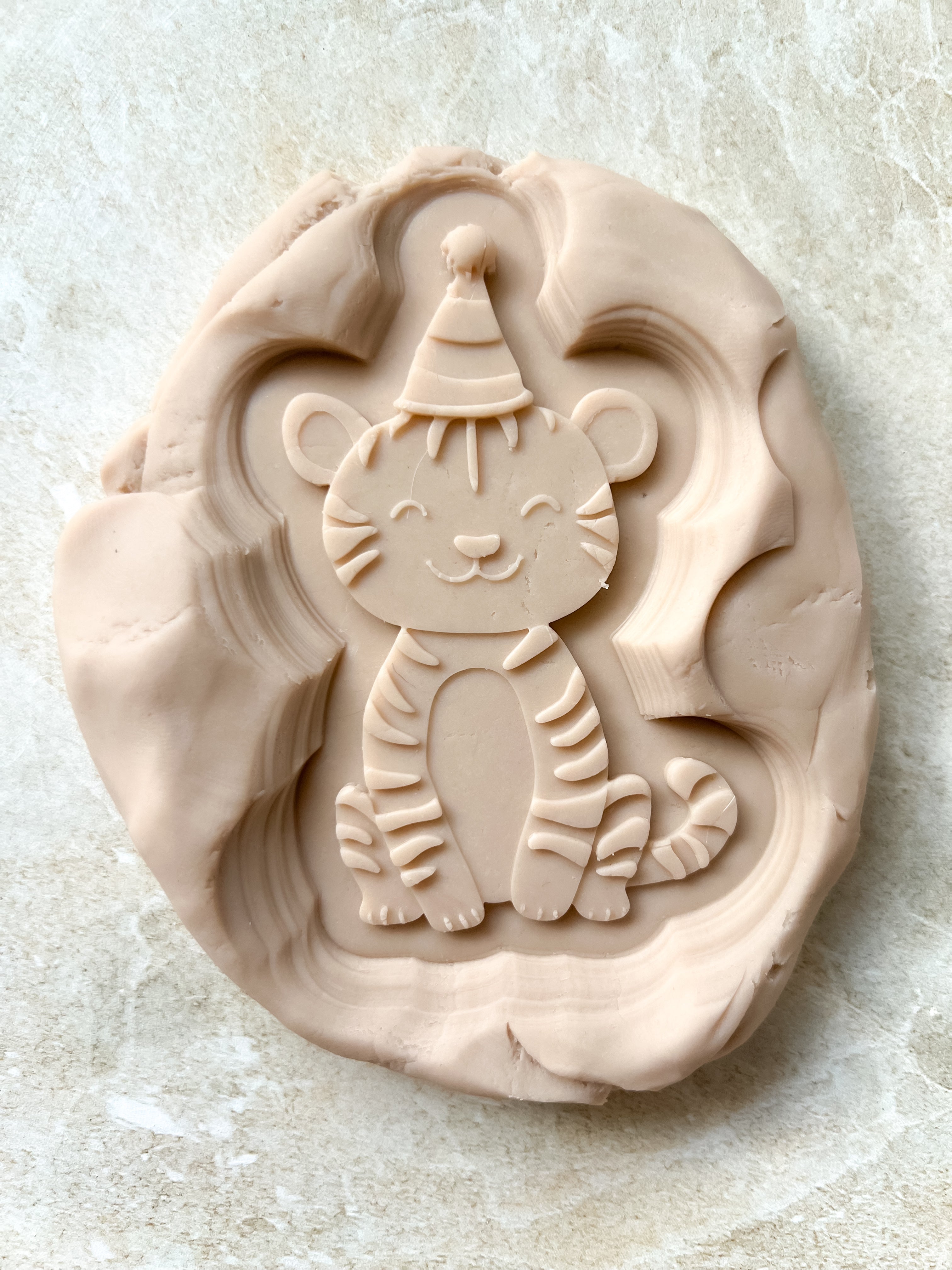 Tiger in party hat debosser and cutter