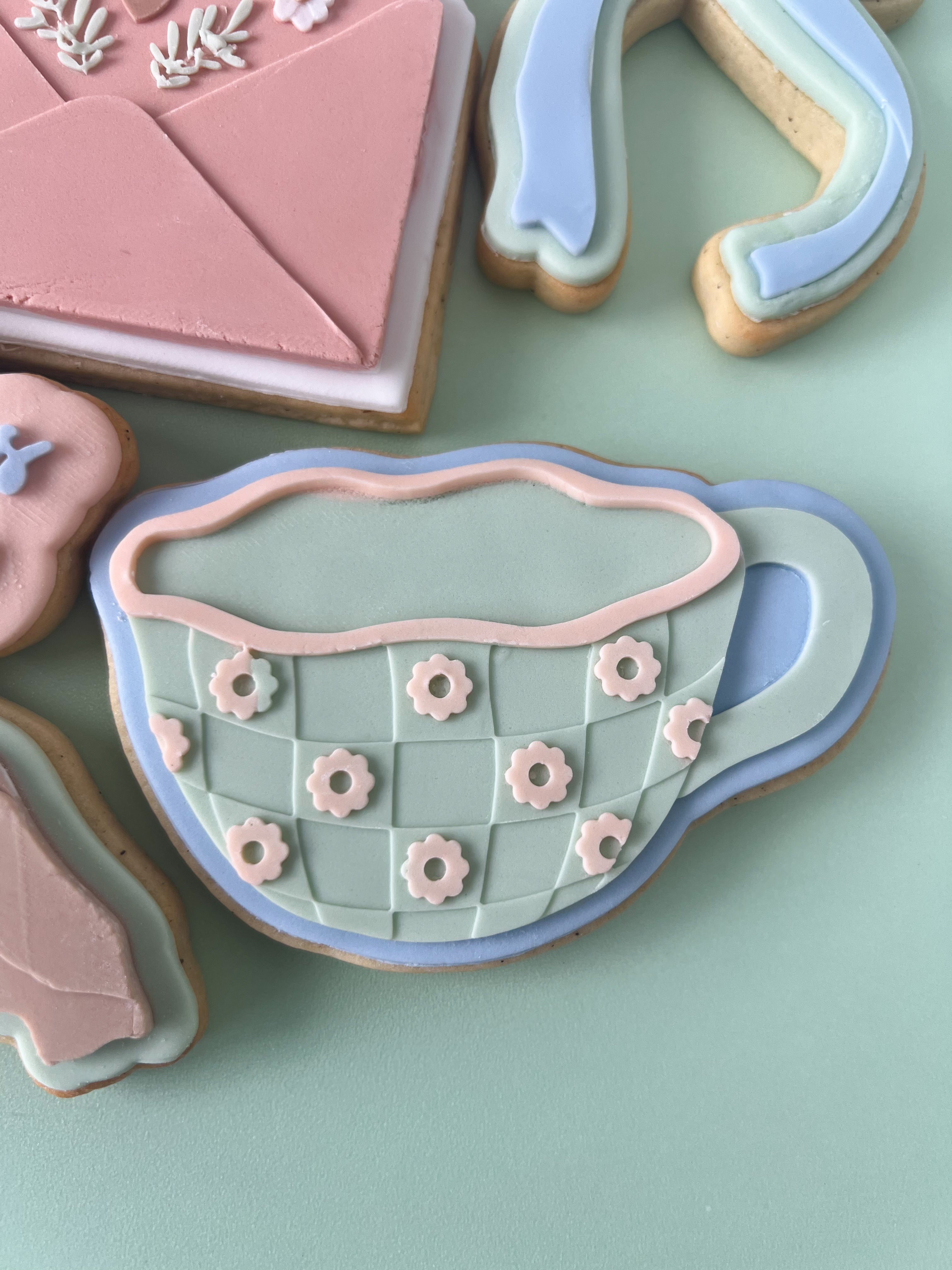 Wavy floral teacup debosser and cutter