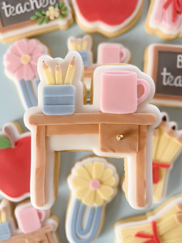 Teacher desk debosser and cutter