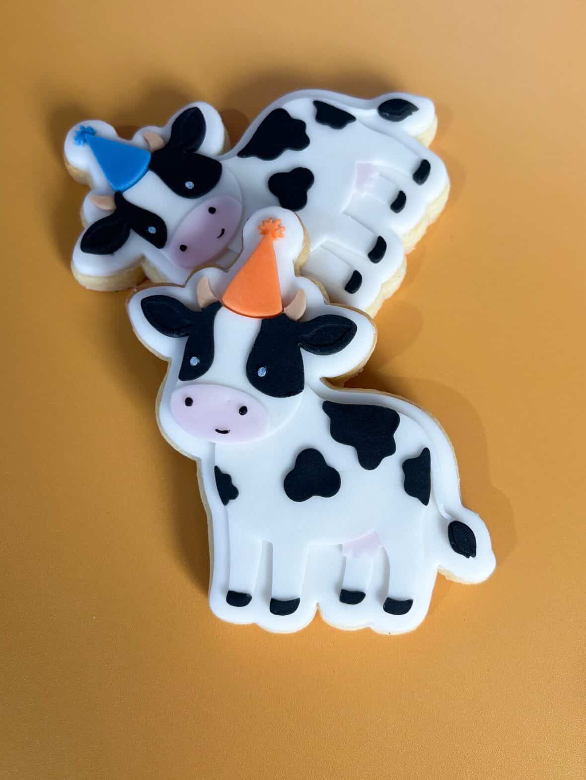 Cow wearing party hat debosser and cutter