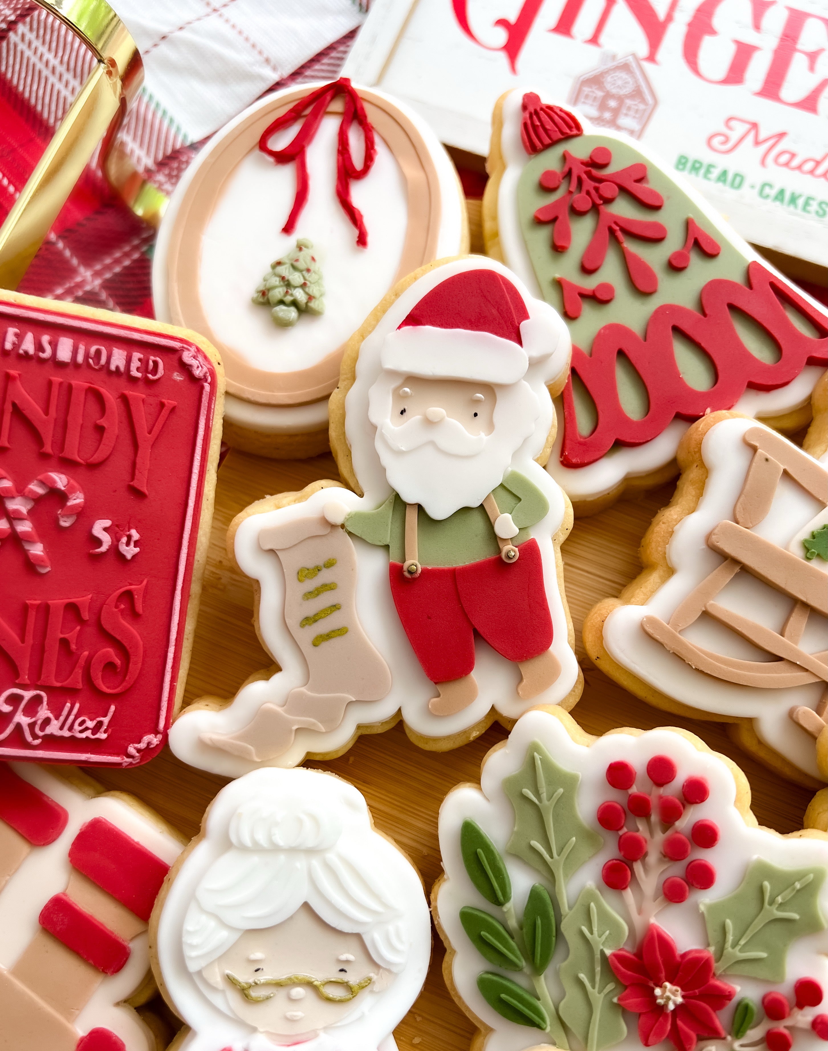 Santa holding list debosser and cutter