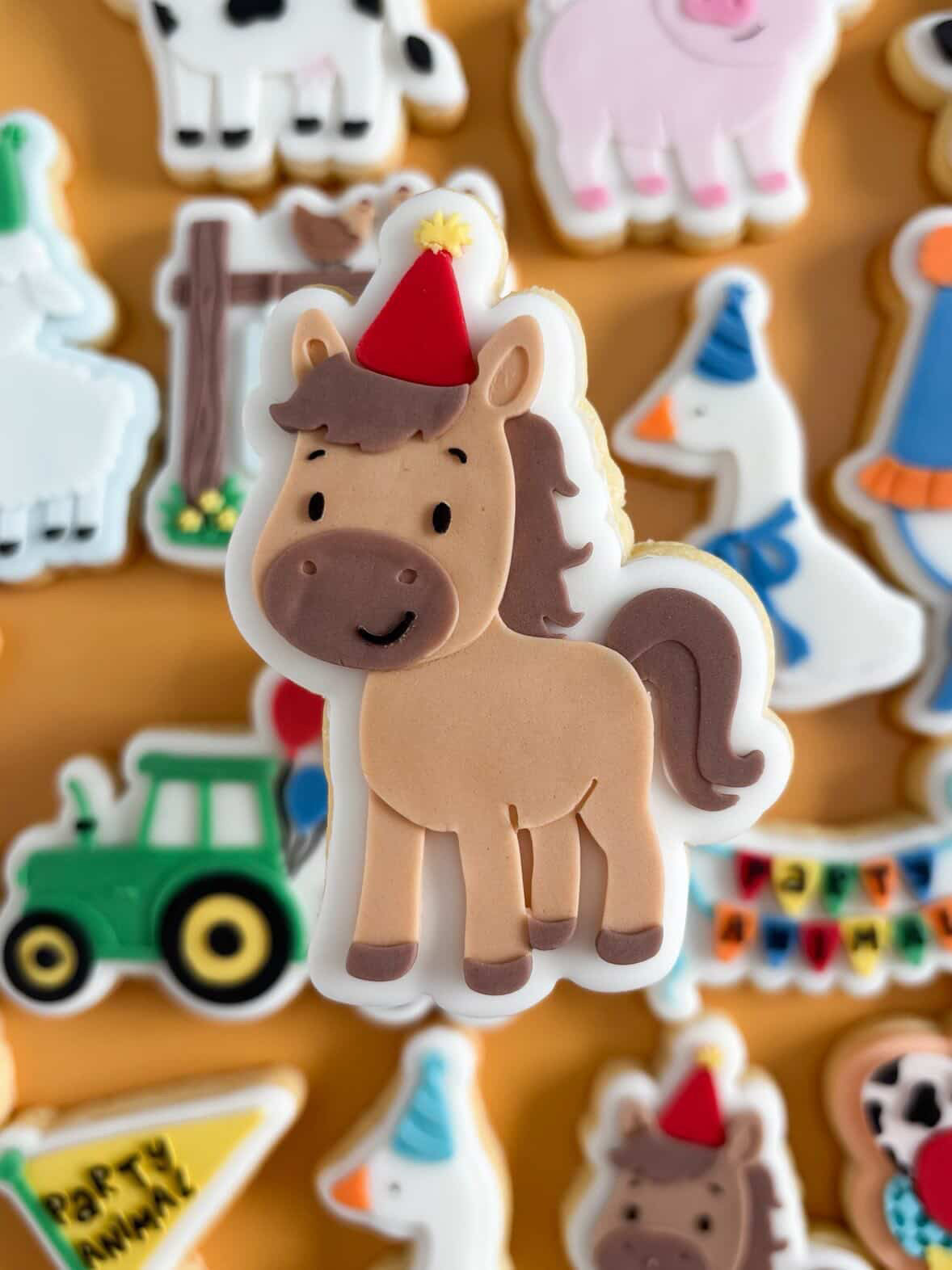 Horse wearing party hat debosser and cutter