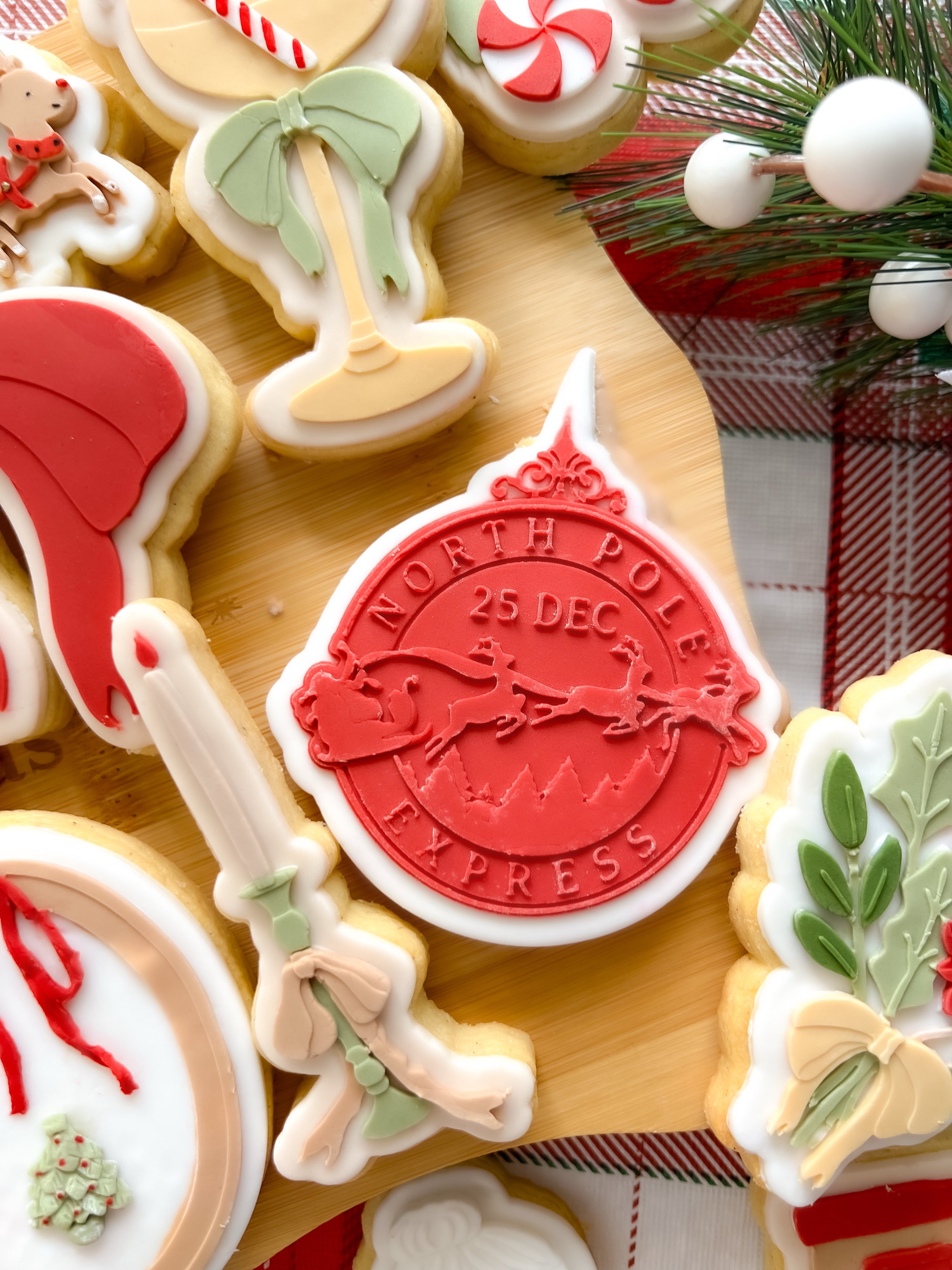 North Pole express postage stamp debosser and cutter