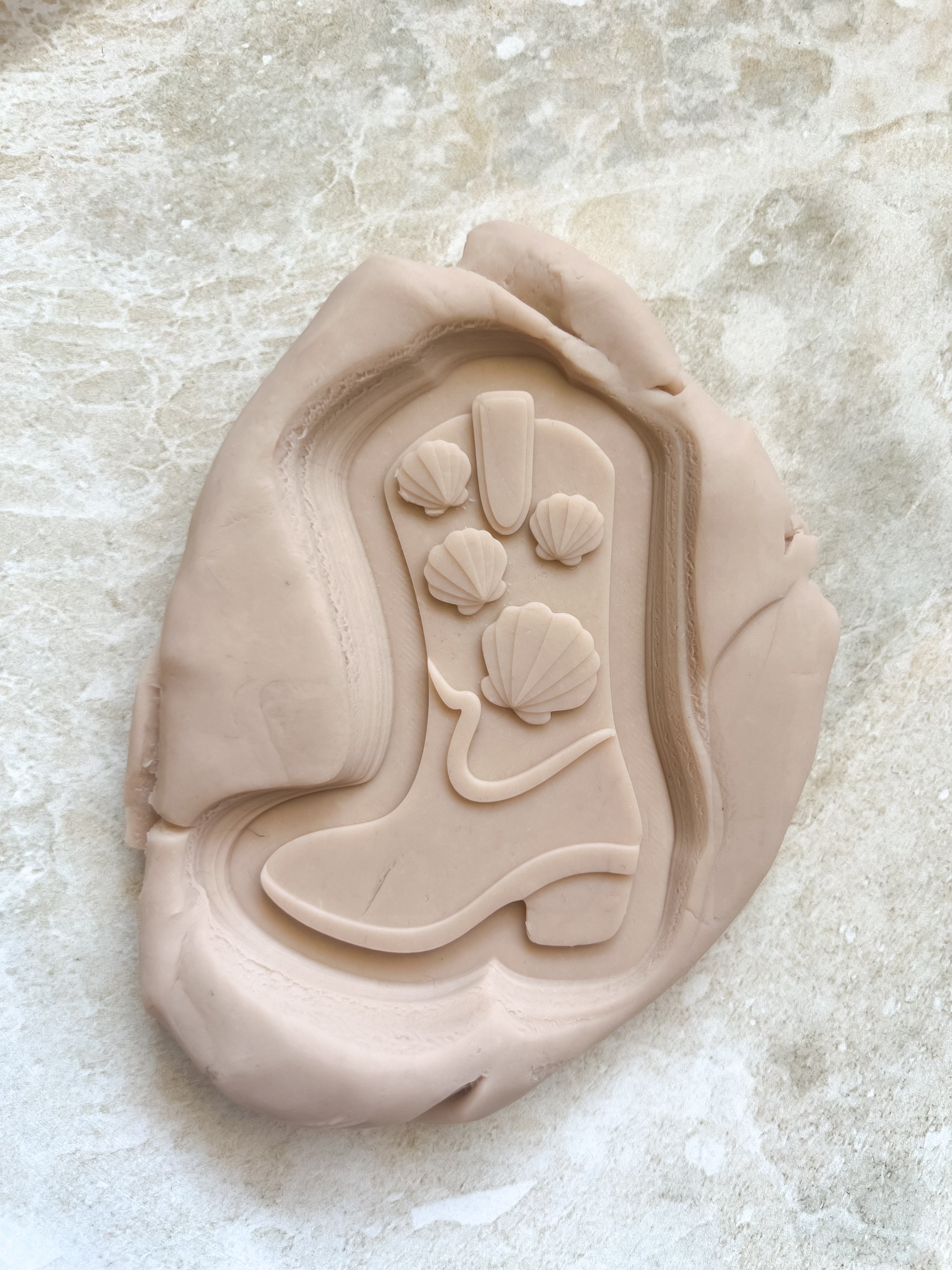 Shell cowgirl boot debosser and cutter