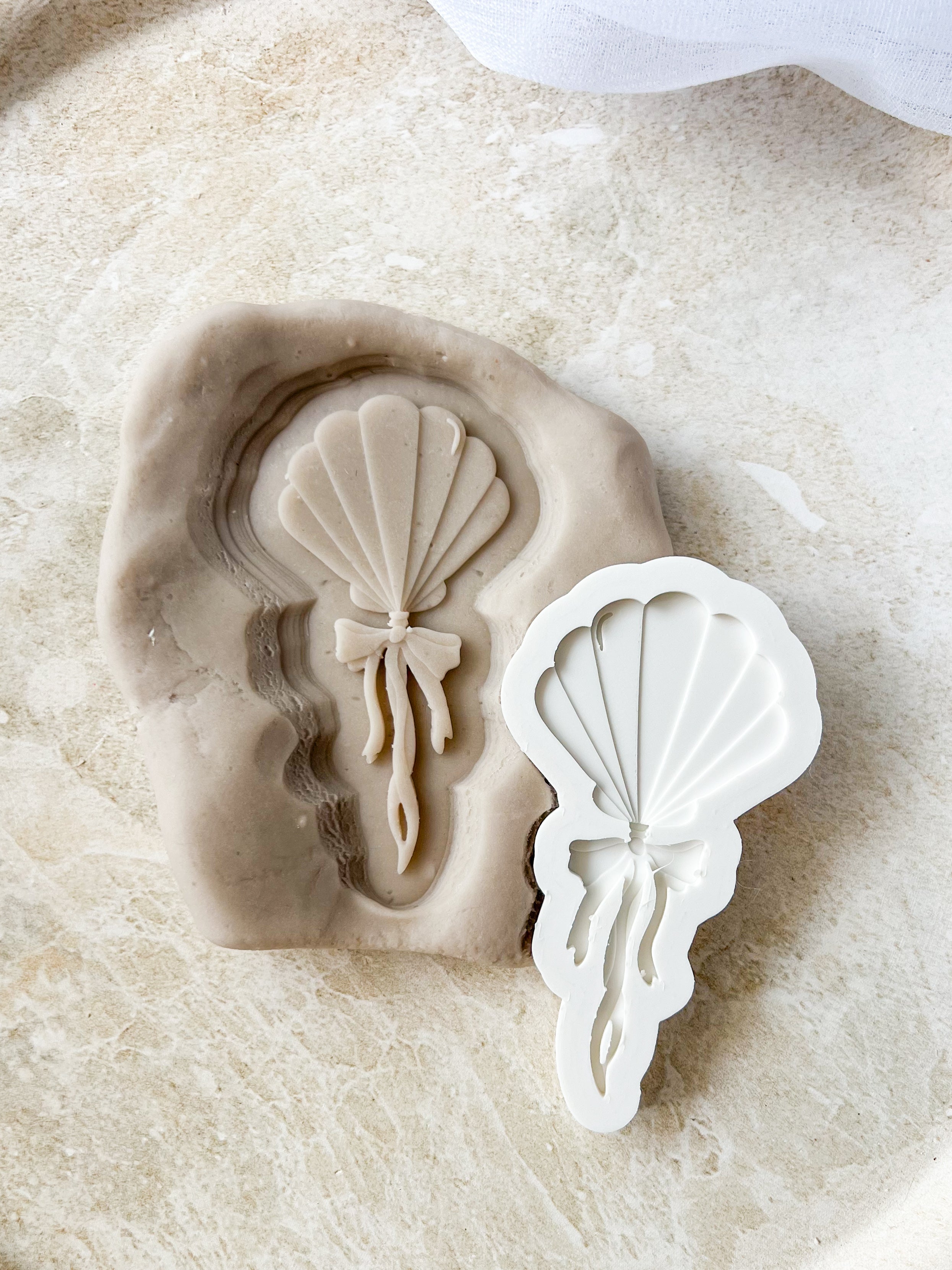 Shell balloon debosser and cutter