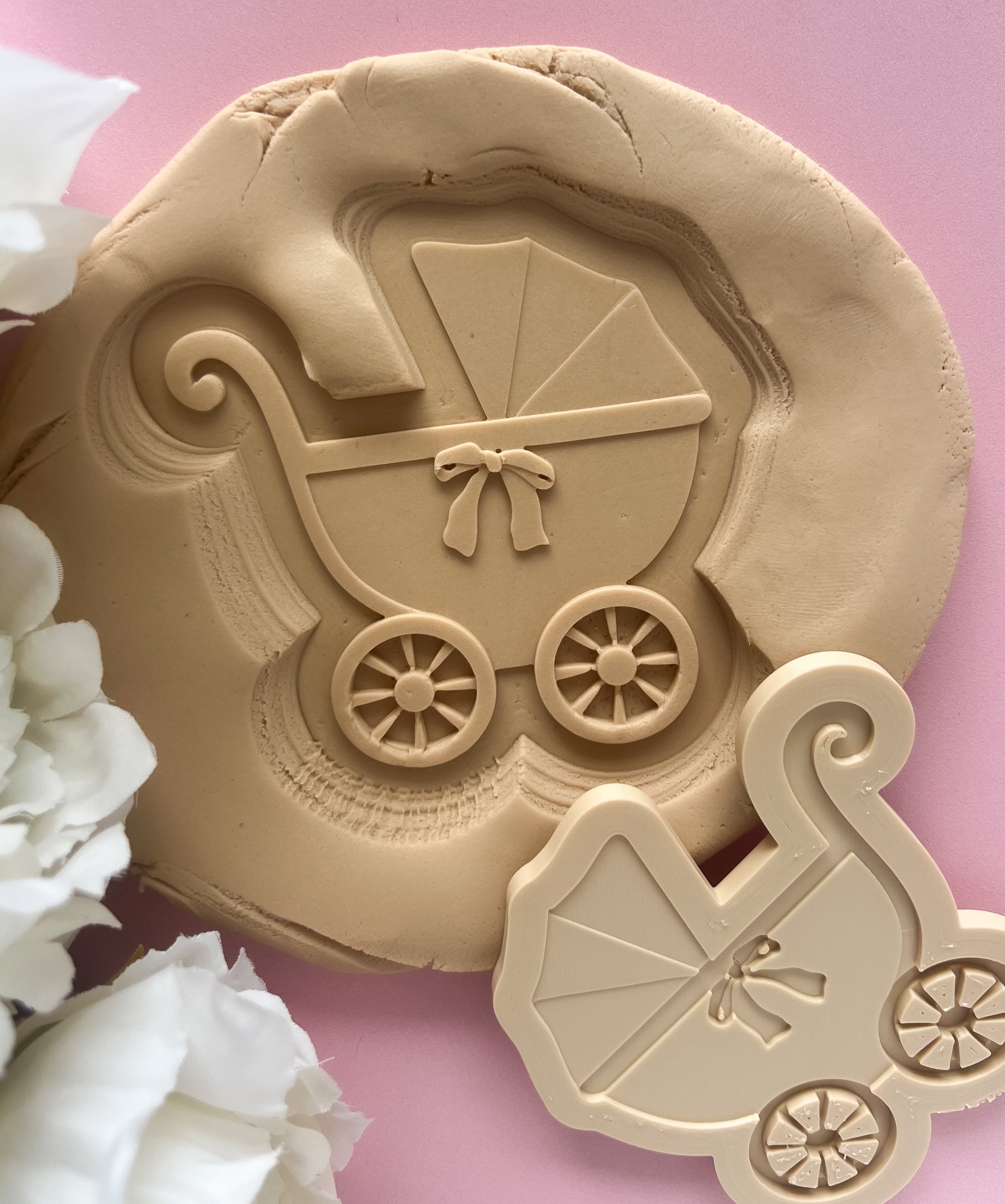 Plain vintage pram with bow debosser and cutter