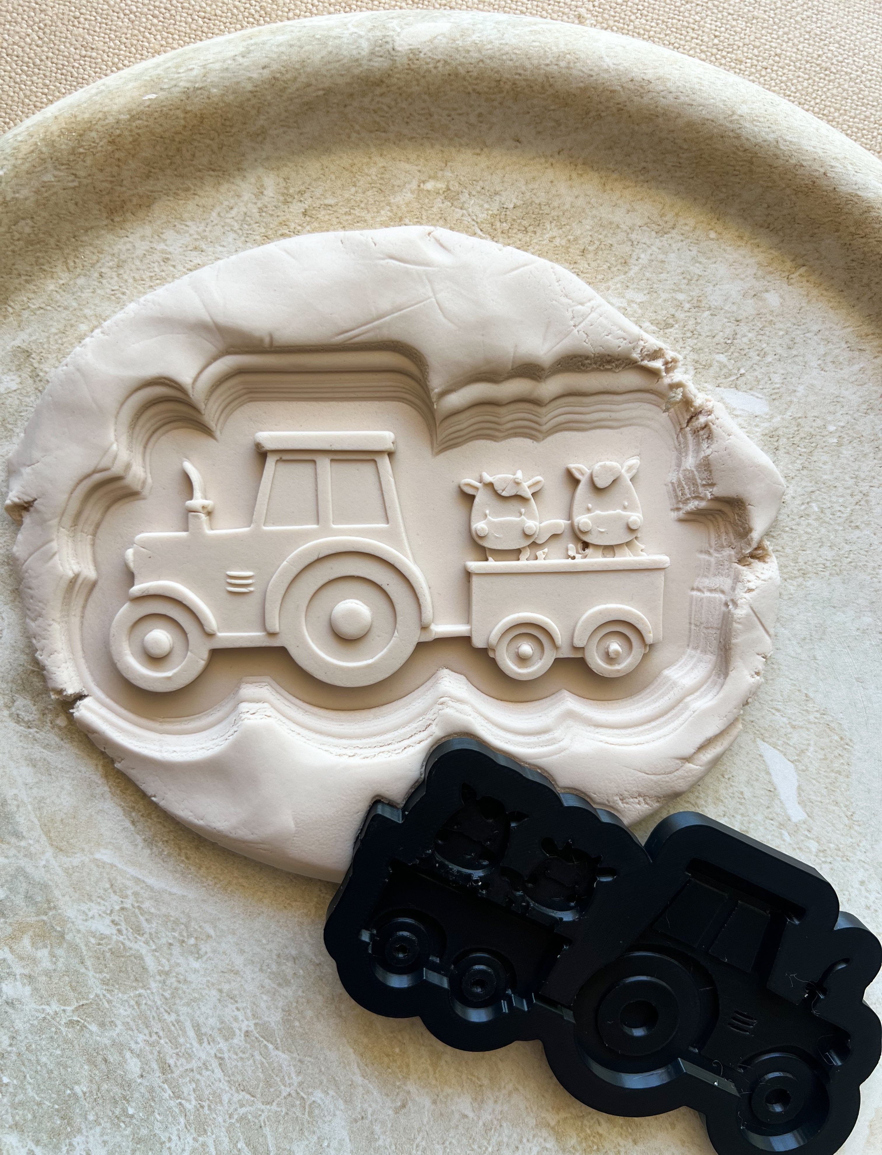 Tractor with horse and cow debosser and cutter