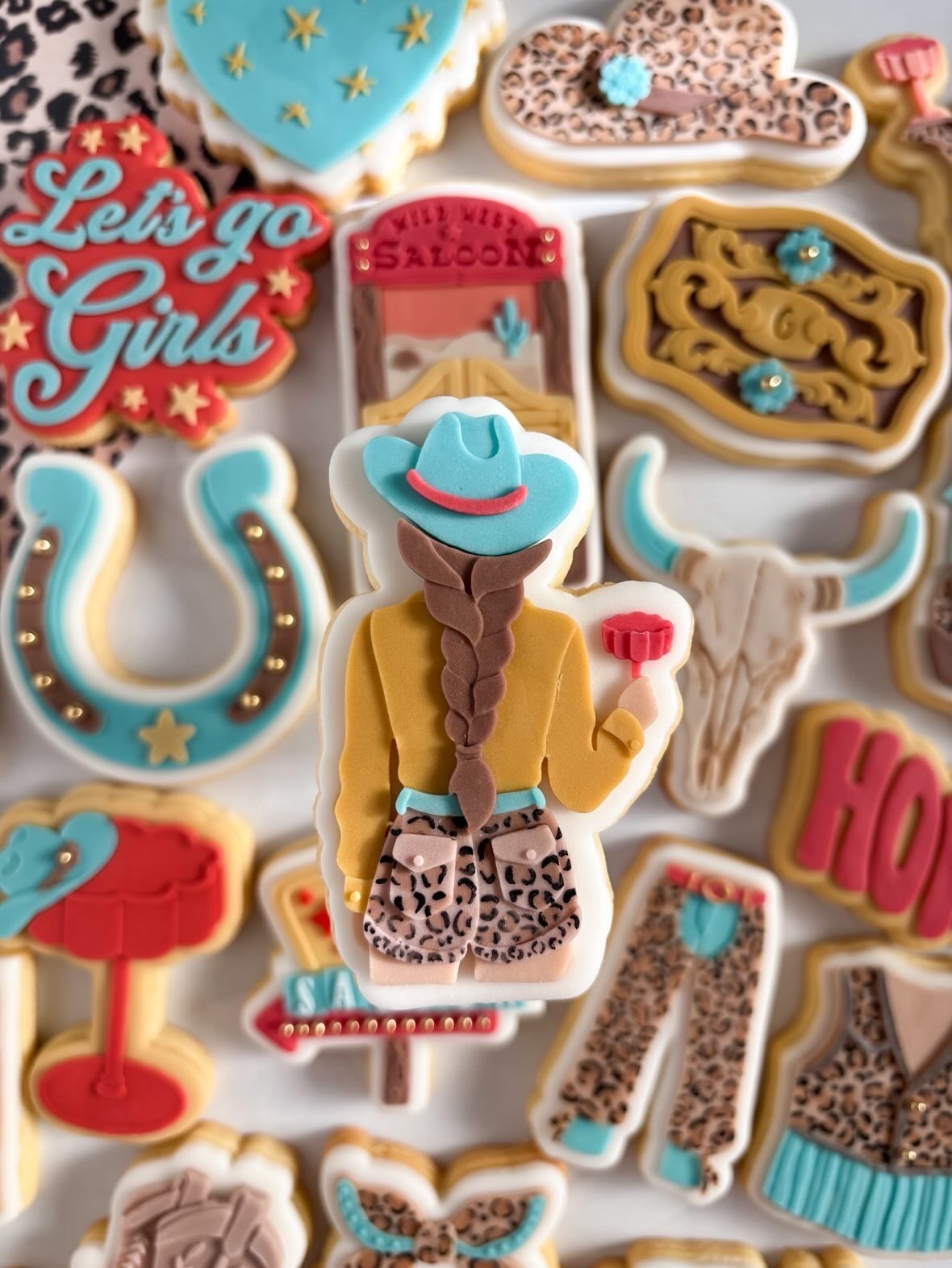 Cowgirl holding cocktail glass debosser and cutter