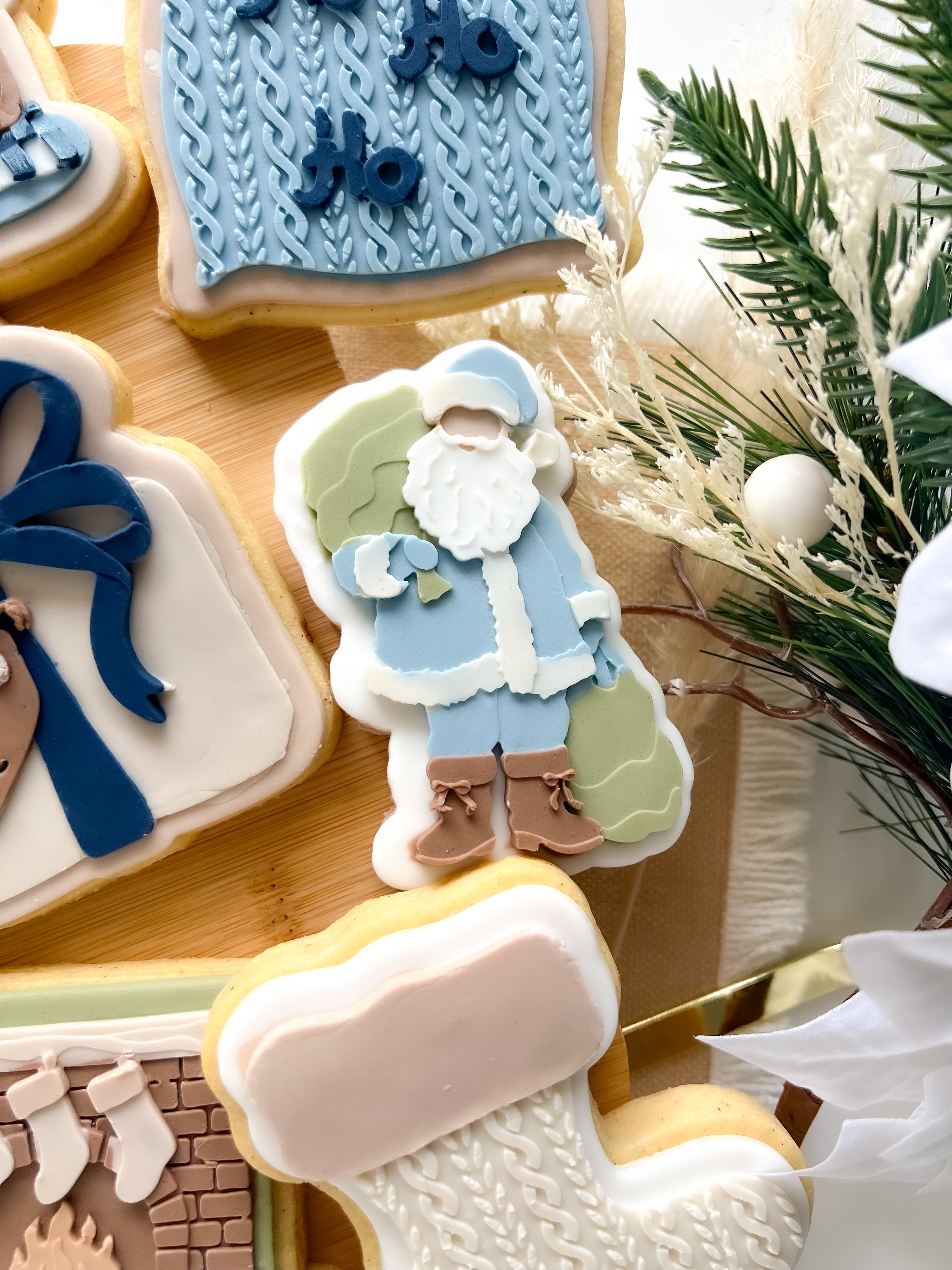 Santa holding sacks debosser and cutter