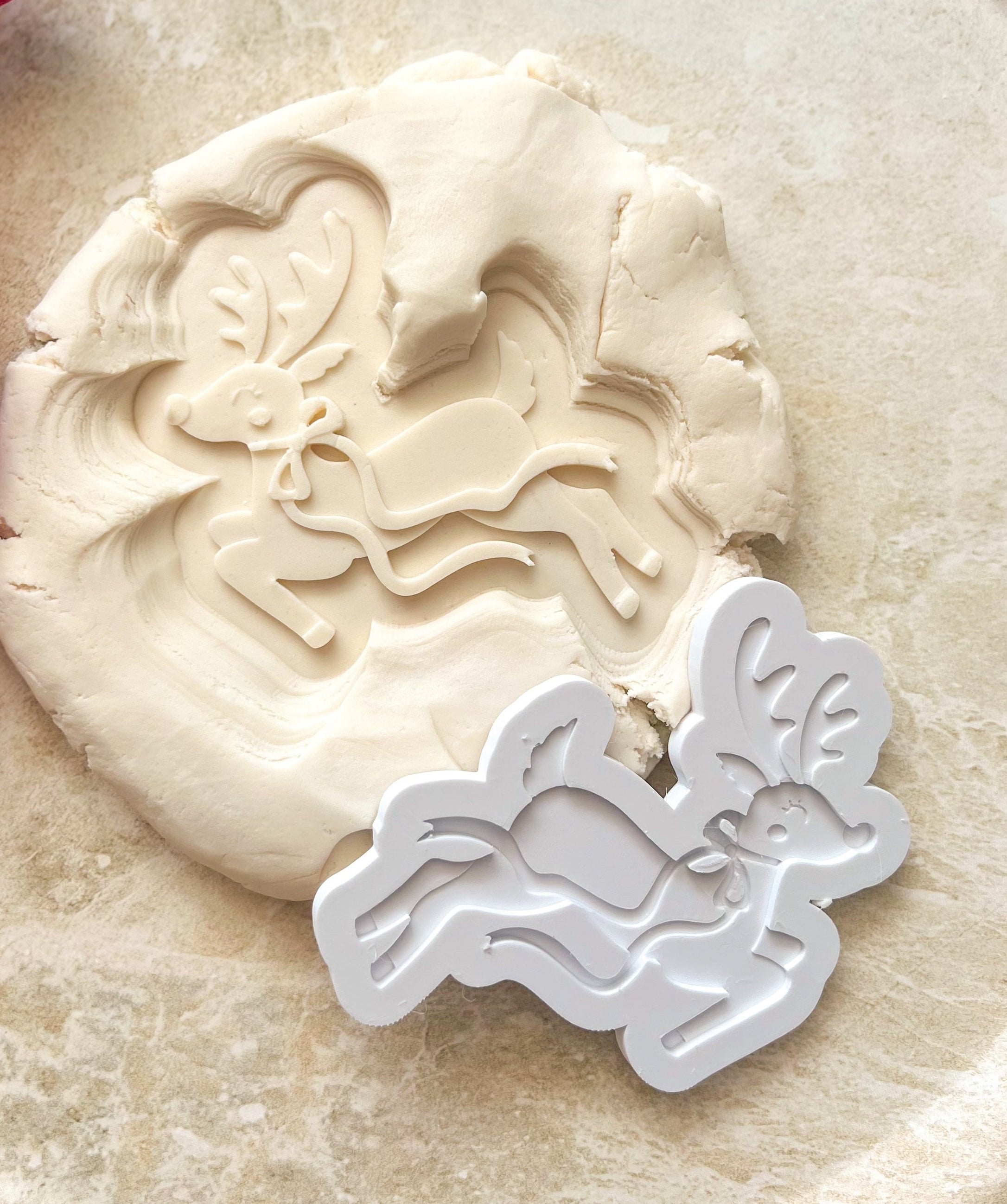 Prancing reindeer debosser and cutter