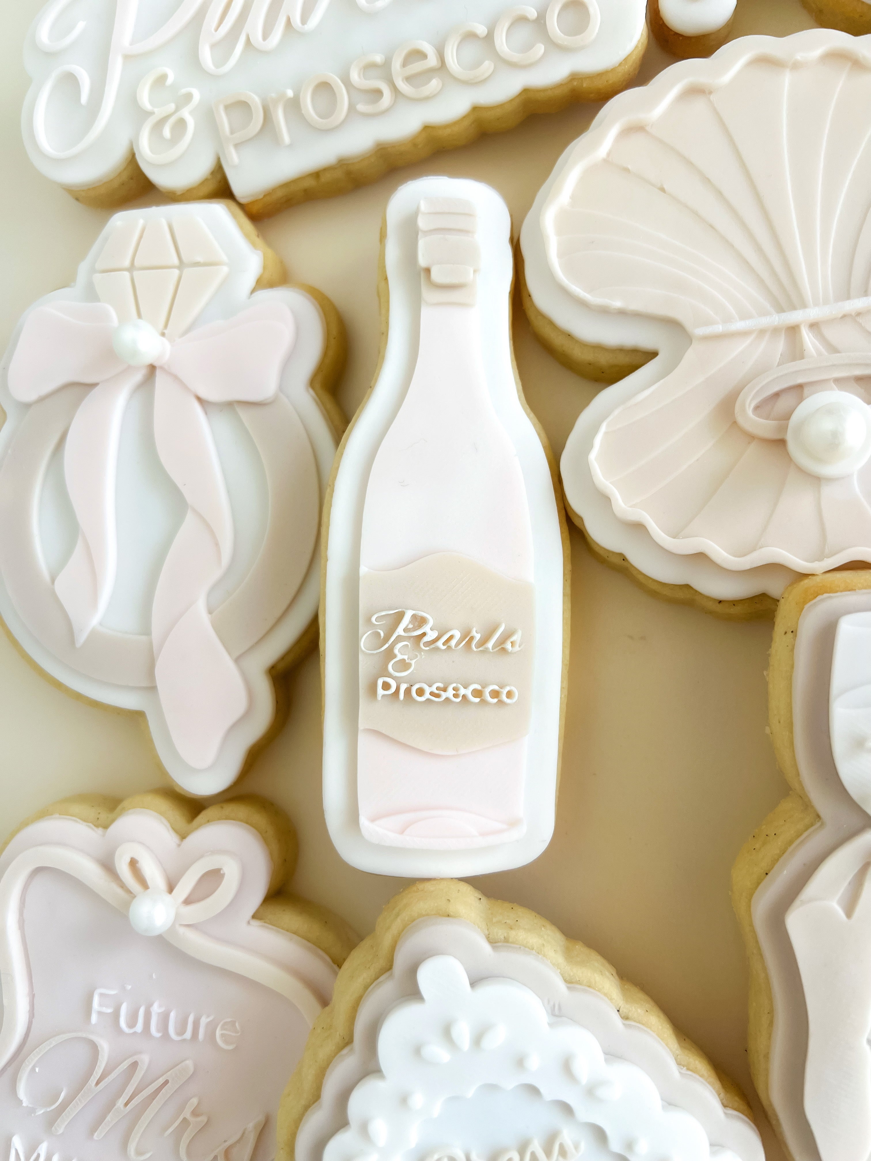 Pearls and prosecco champagne bottle debosser and cutter
