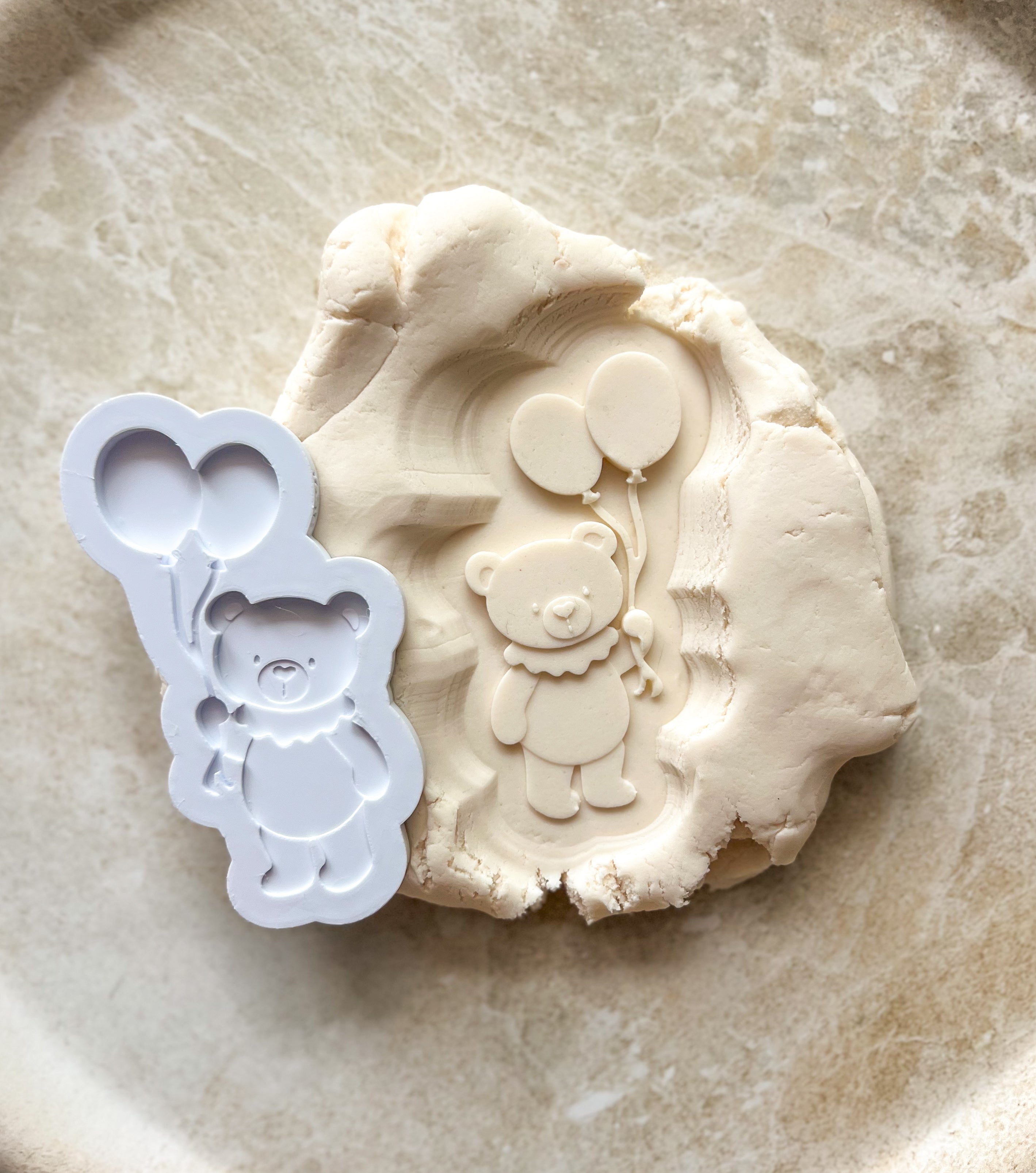 Bear holding balloons debosser and cutter