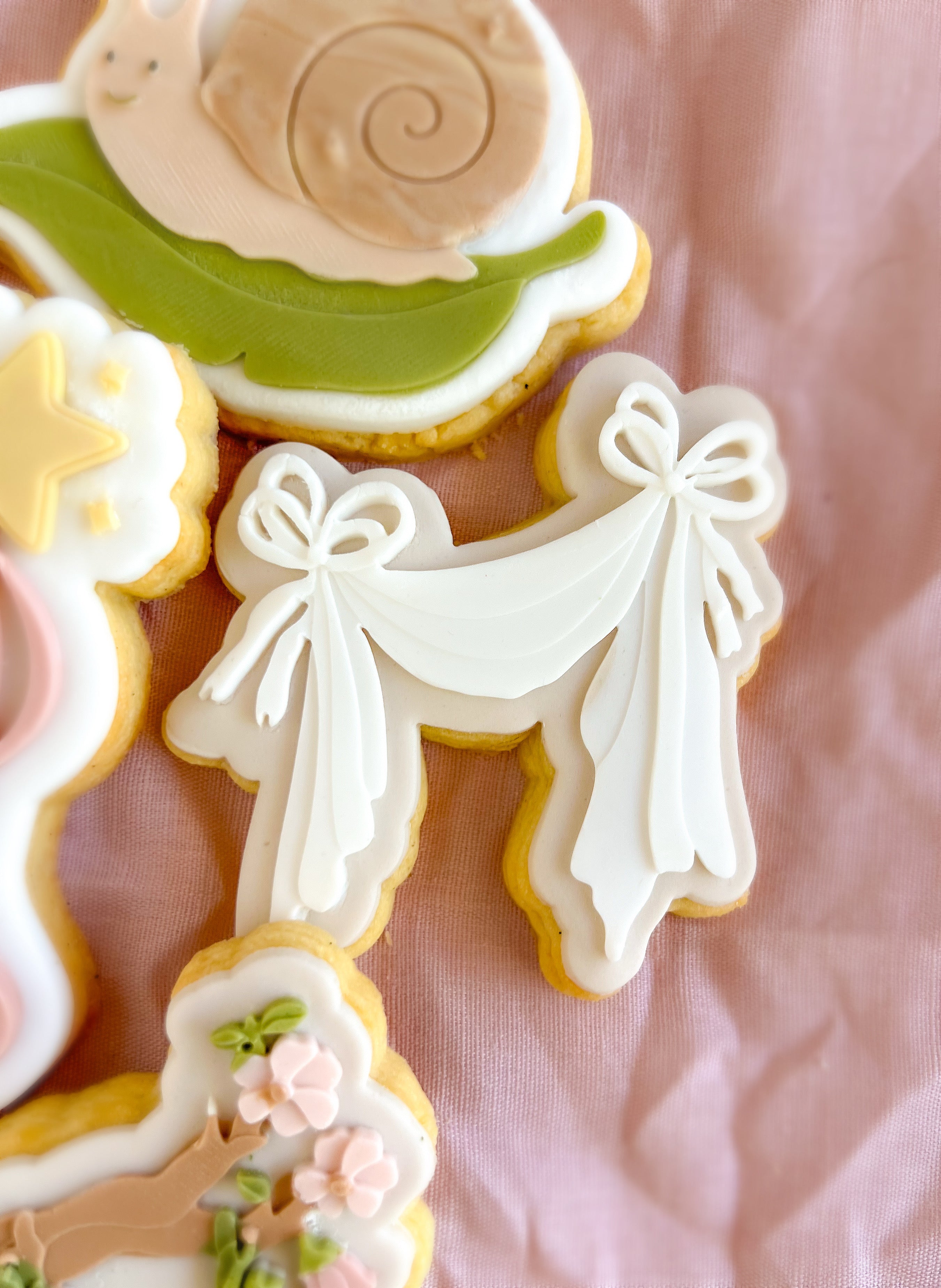 Draped curtain debosser and cutter