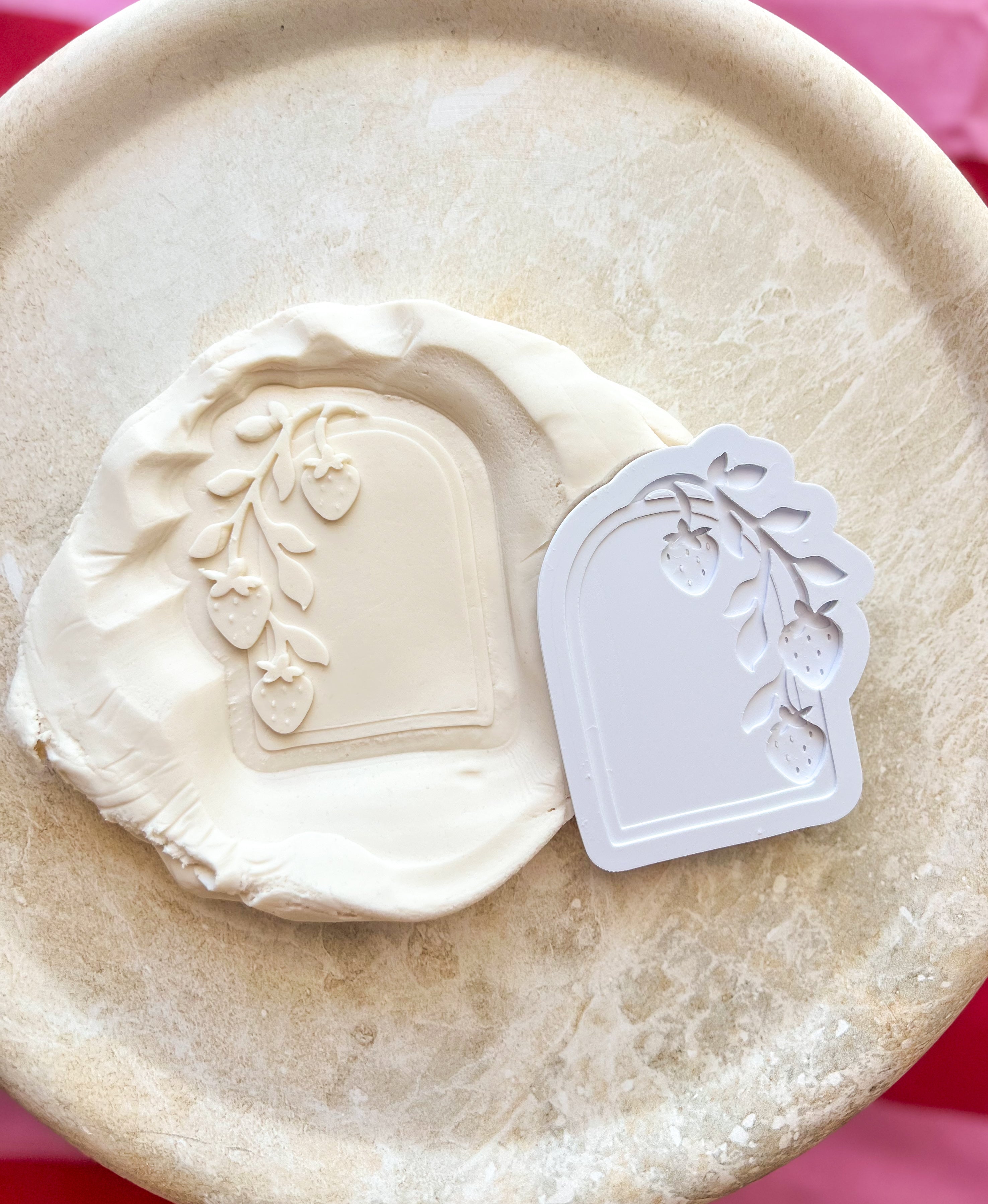 Strawberry arch debosser and cutter