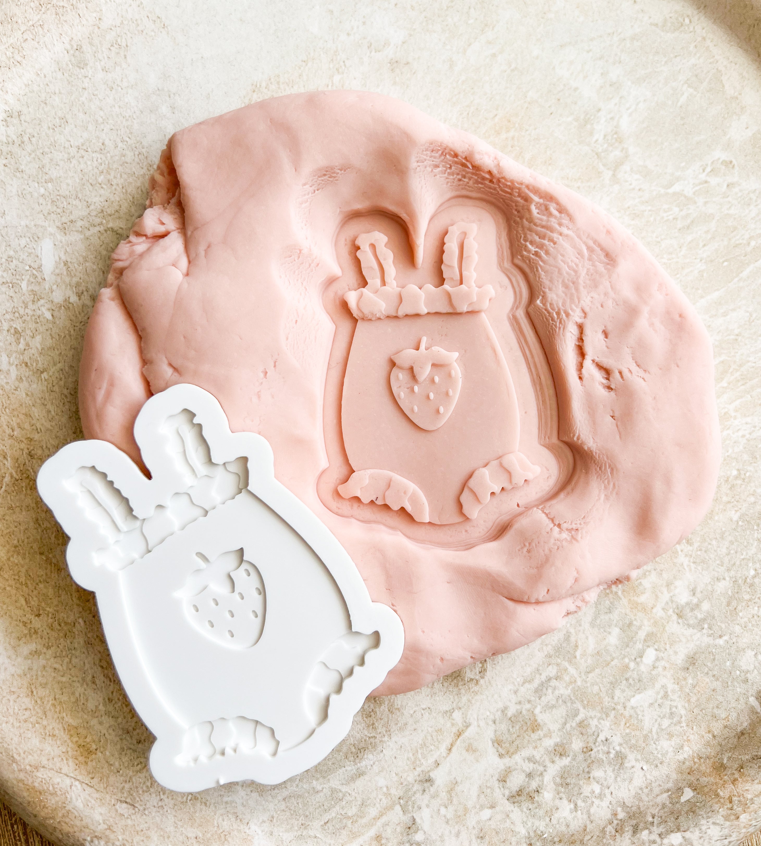 Berry baby onesie debosser and cutter