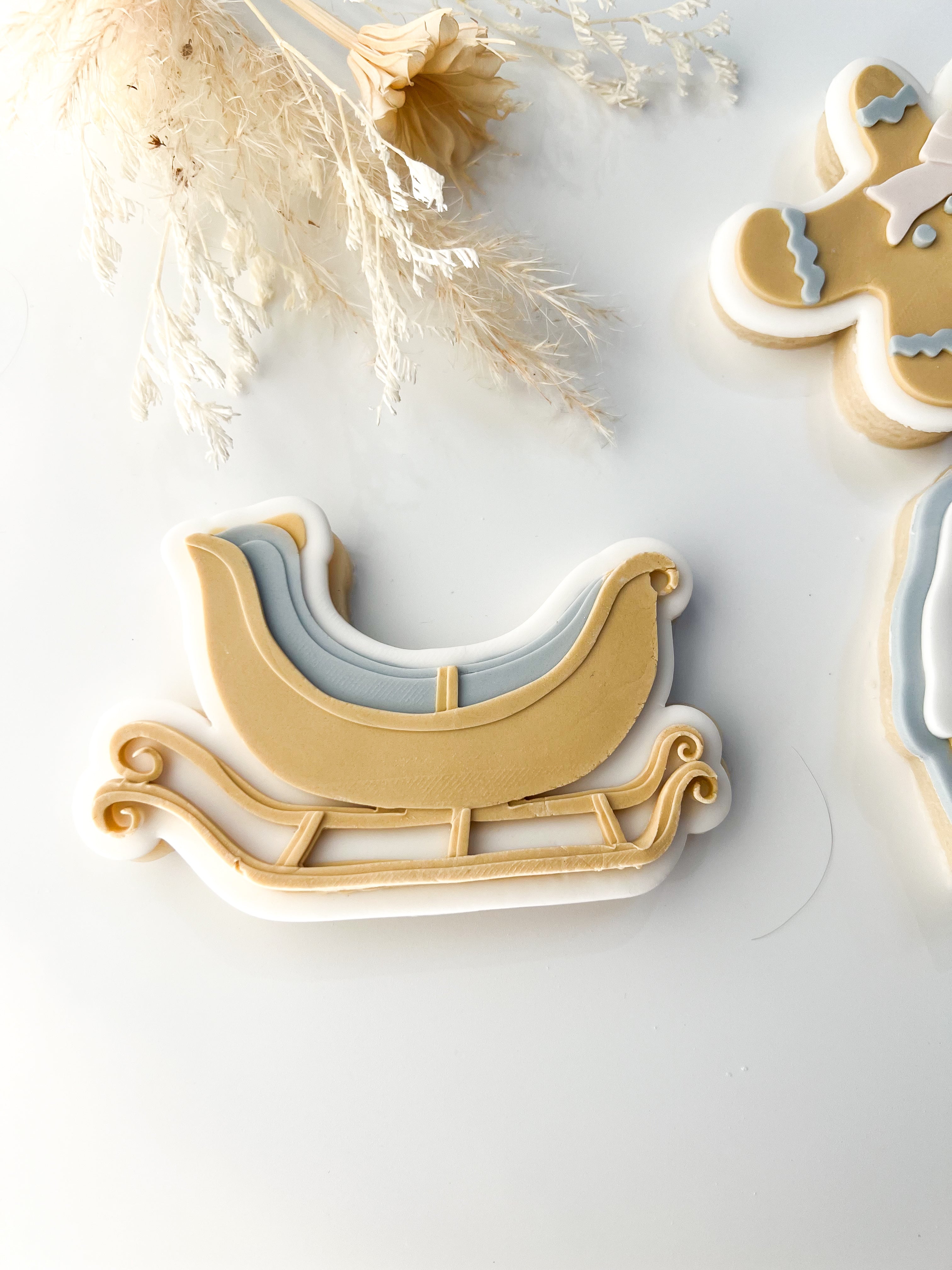 Sleigh debosser and cutter