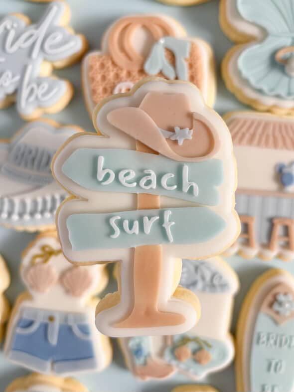 Beach sign with cowgirl hat debosser and cutter