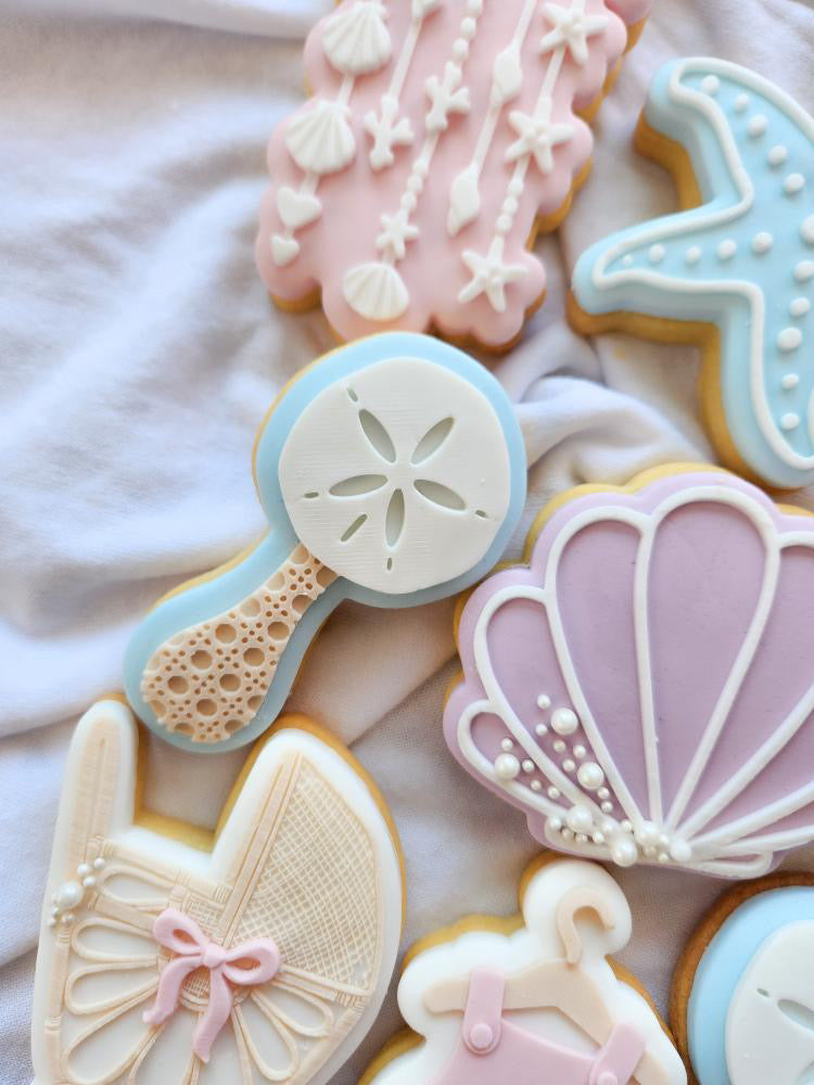 Sand dollar baby rattle debosser and cutter