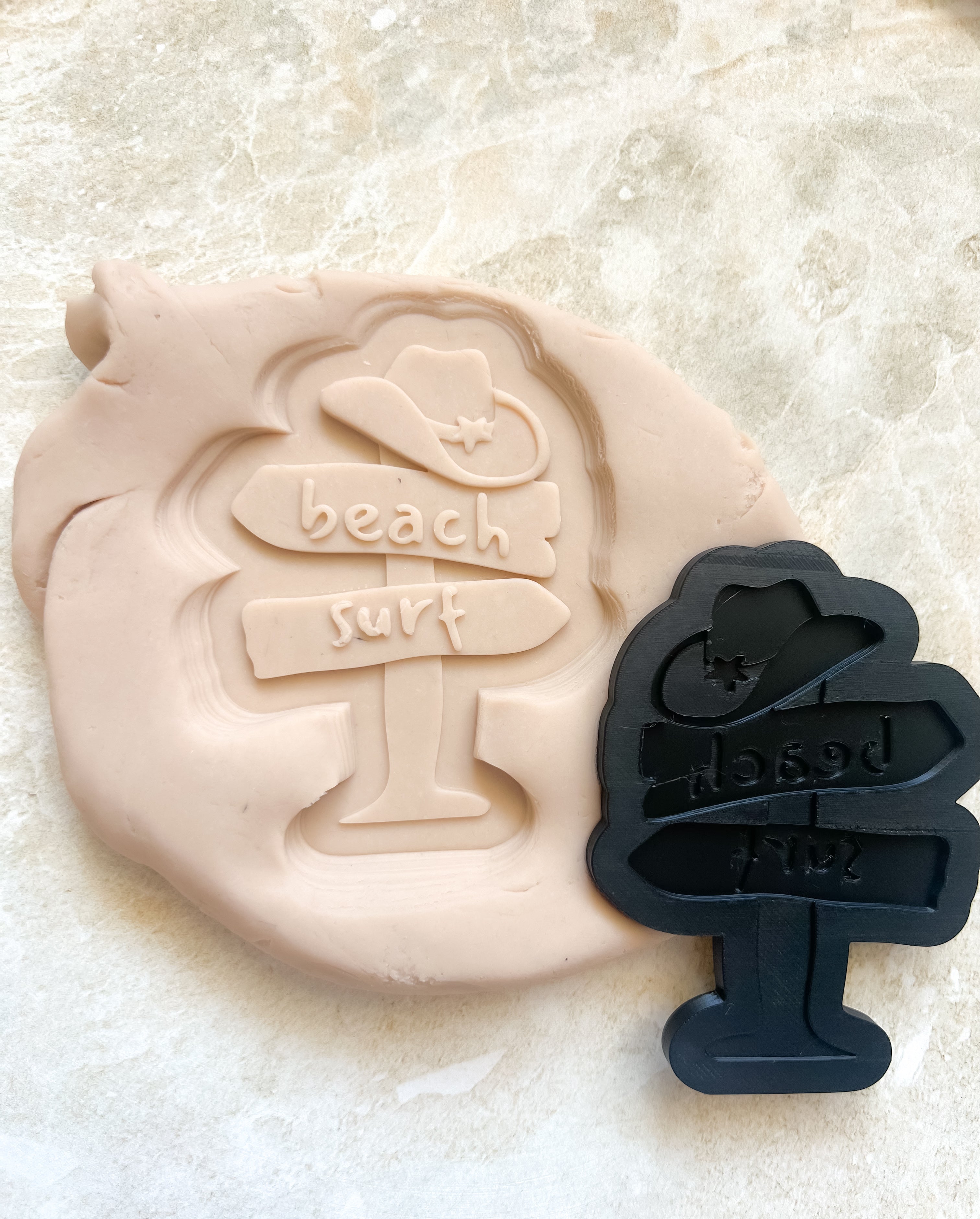 Beach sign with cowgirl hat debosser and cutter