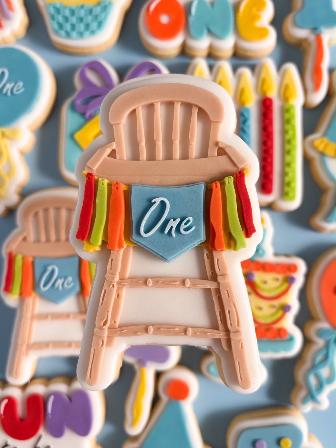 Wooden high chair with ONE bunting debosser and cutter