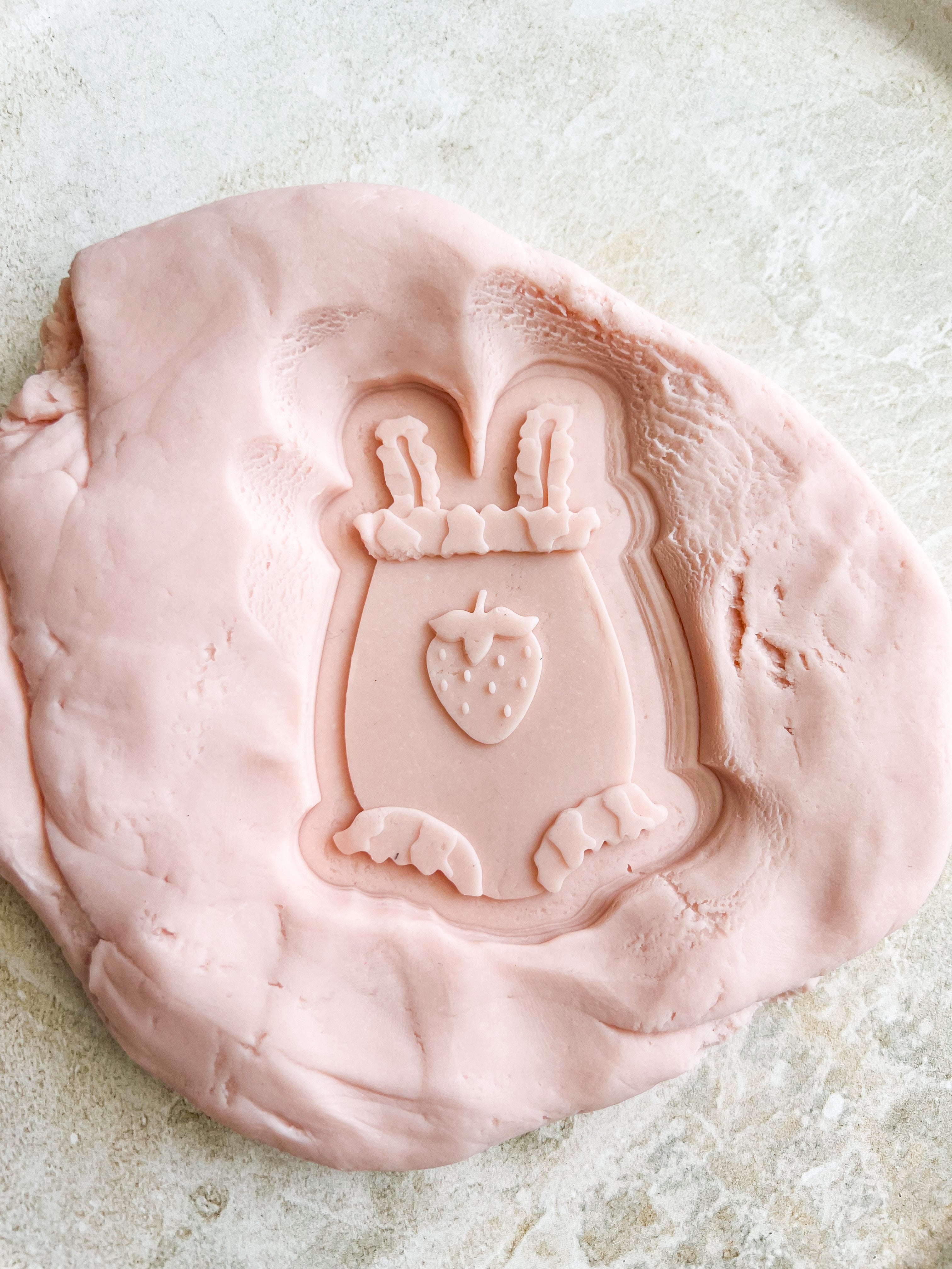 Berry baby onesie debosser and cutter