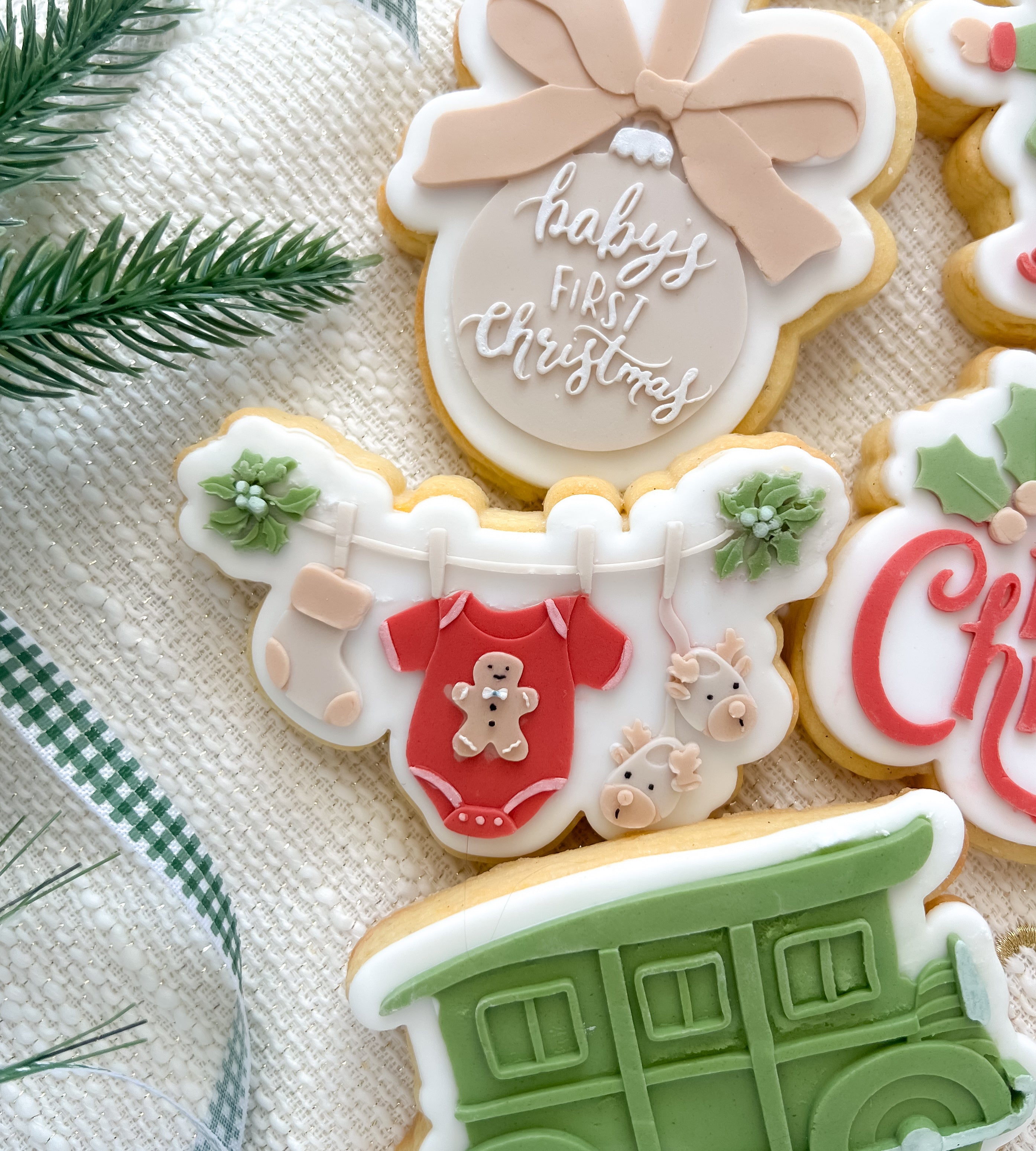 Christmas baby clothes on clothesline debosser and cutter