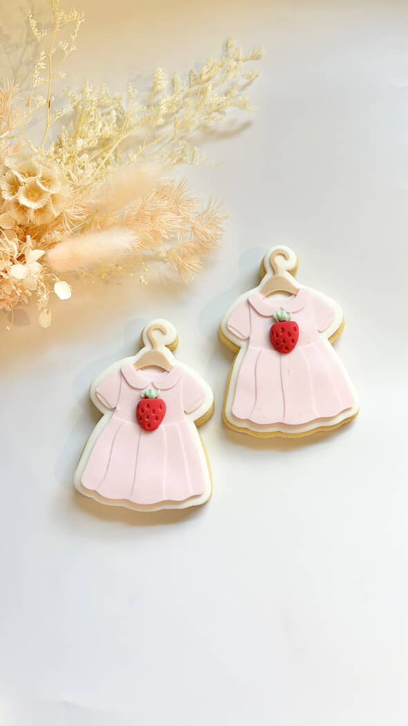 PLAIN baby dress on coat hanger debosser and cutter