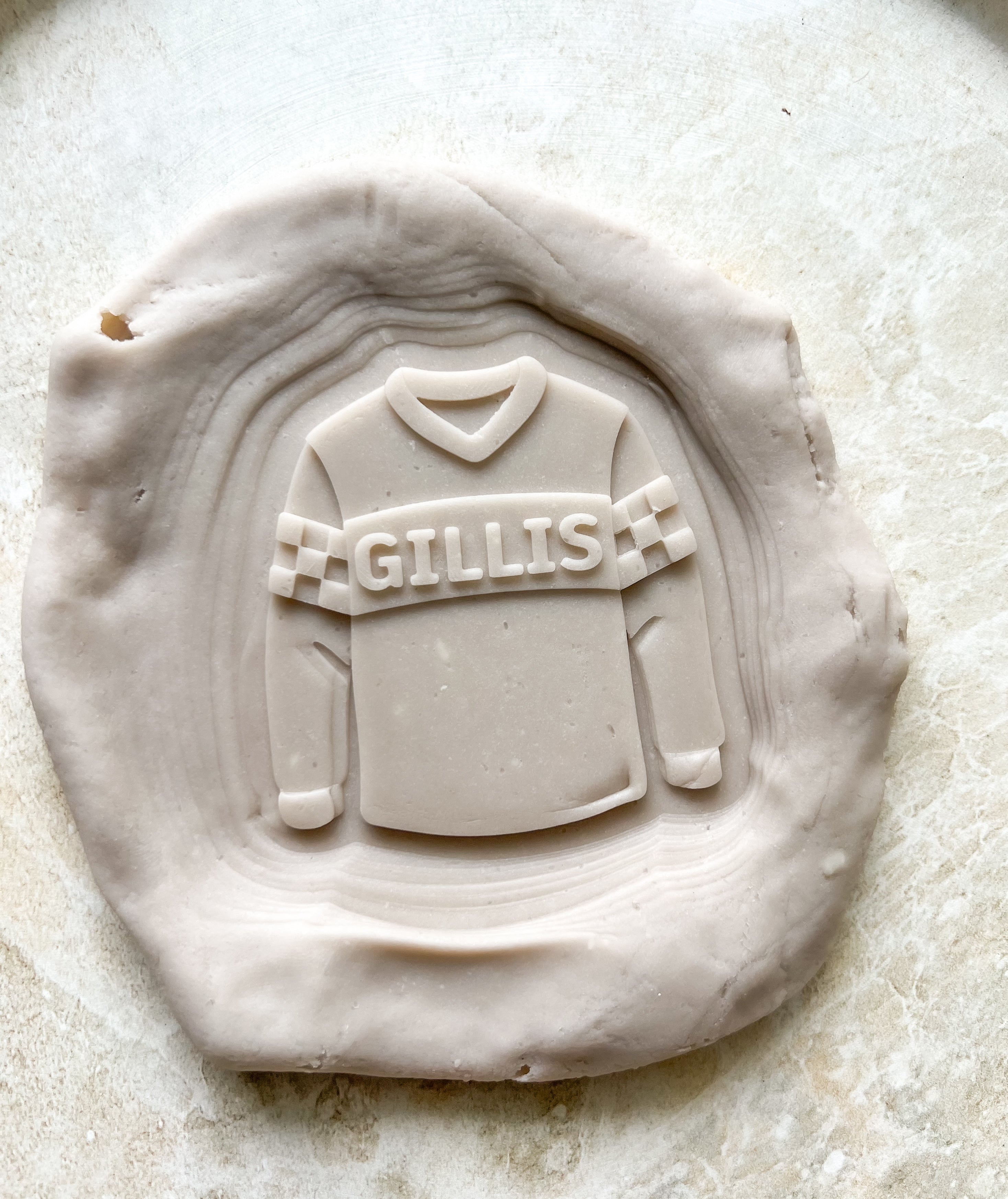 Motorbike jersey debosser and cutter