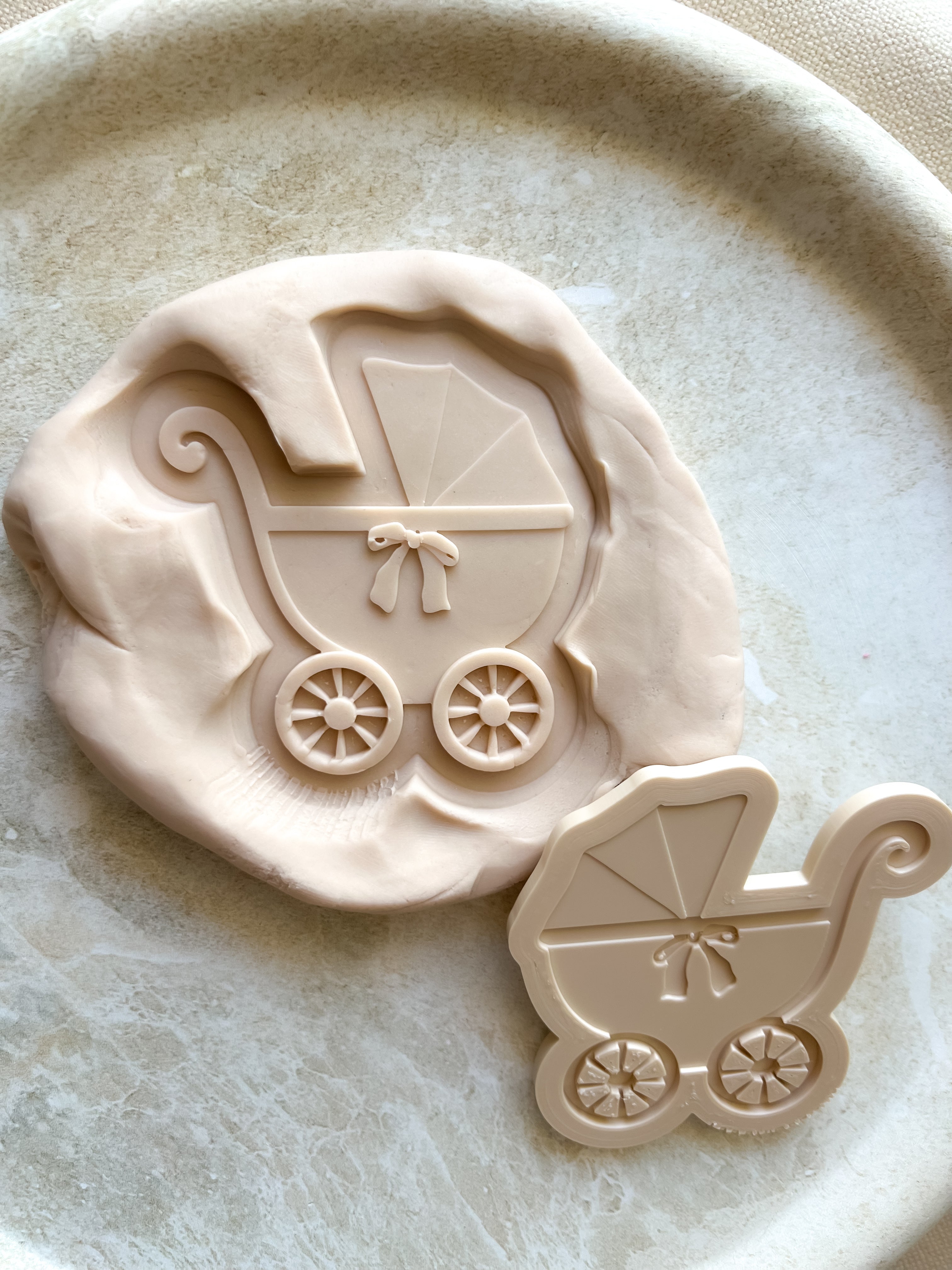 Plain vintage pram with bow debosser and cutter