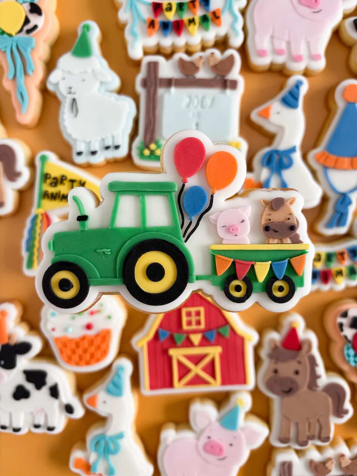 Tractor with party farm animals debosser and cutter