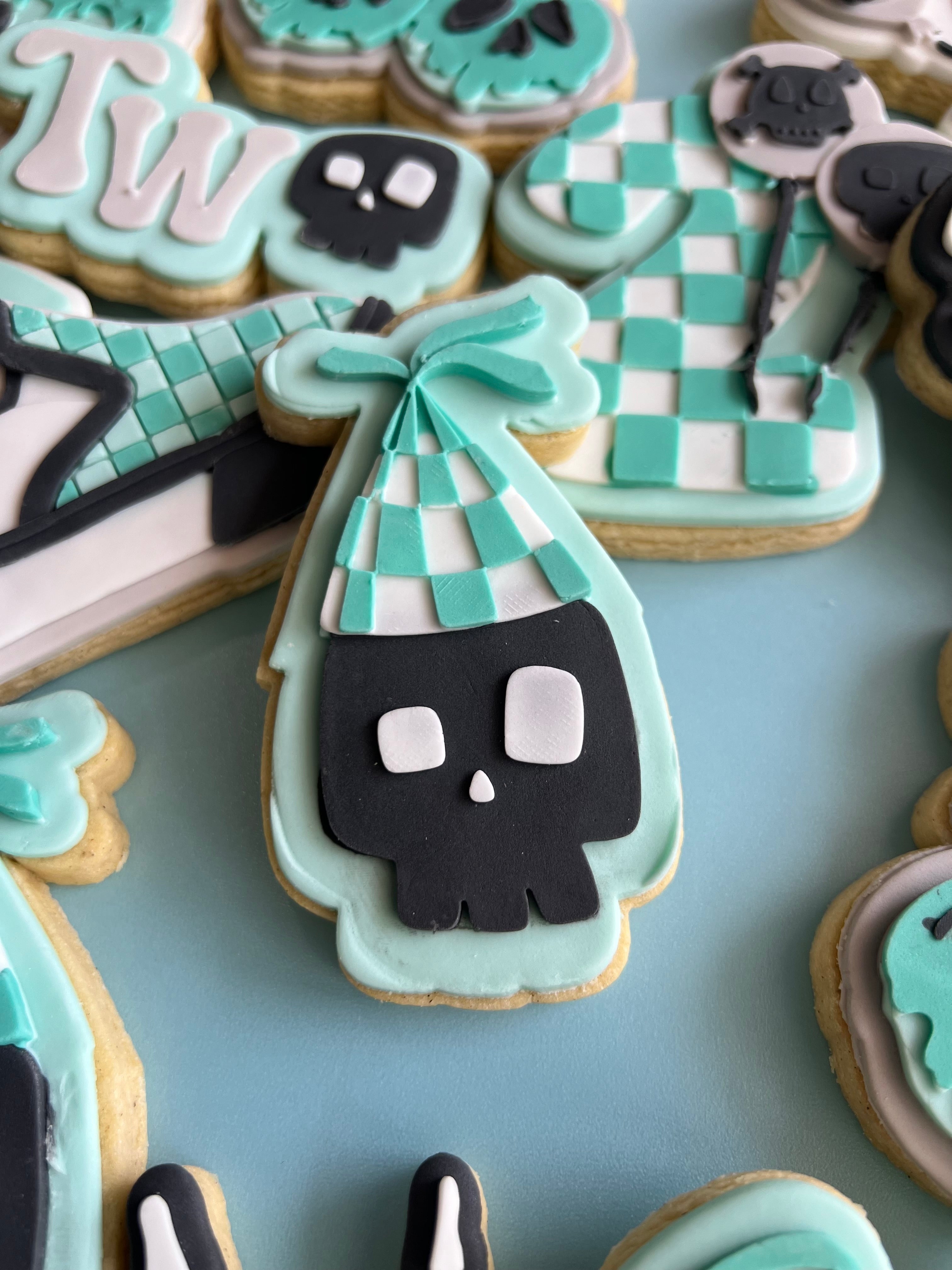 Skull wearing party hat debosser and cutter